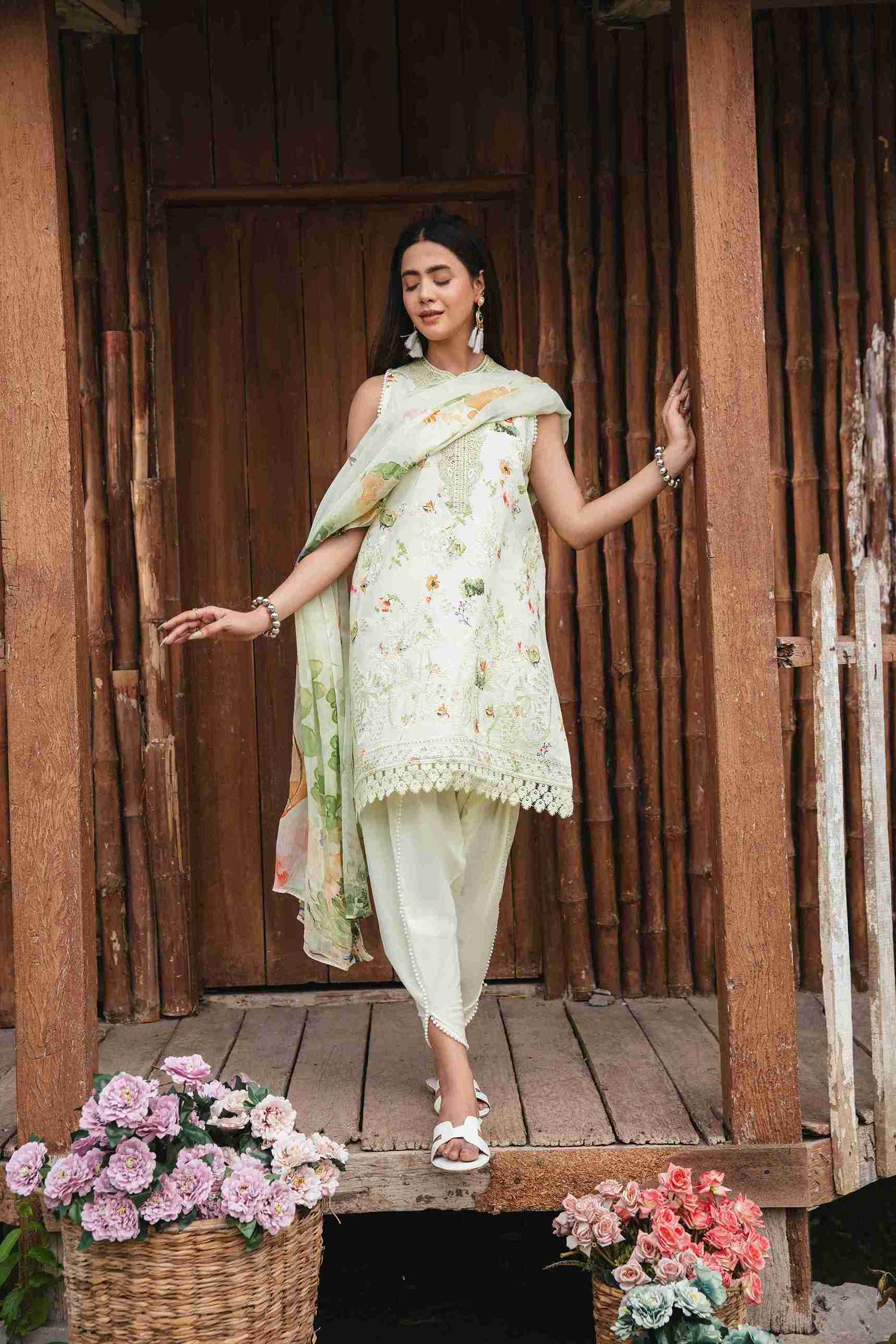 Embroidered lawn dress with chiffon dupatta and cotton plain dyed trouser.