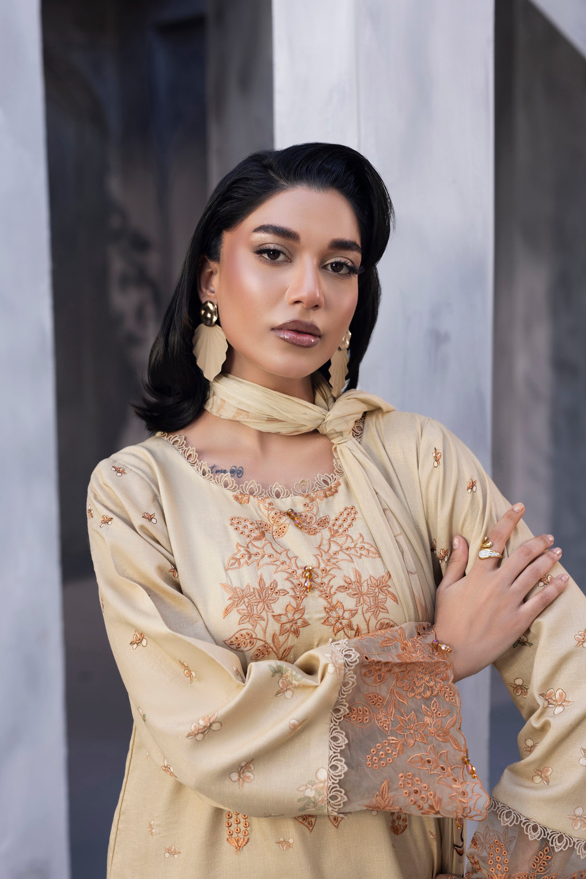 Embroidered Karandi 3PC dress featuring a detailed shirt, chiffon dupatta, and plain trouser