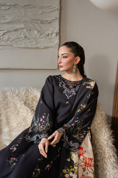 Khaddar dress with soft organza borders and neat dyed trouser.