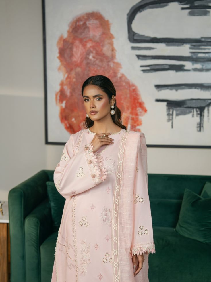 Cream color stitched wedding outfit with embroidered shirt, motifs, organza patch, and dupatta