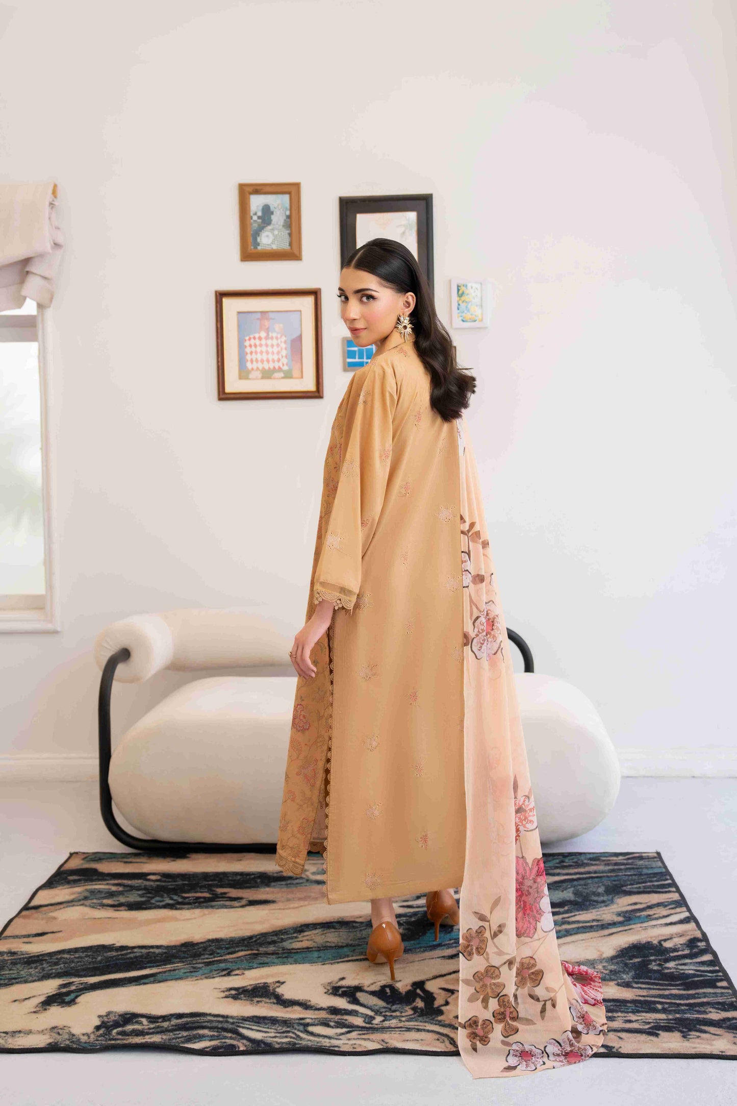 Premium embroidered lawn suit crafted with chiffon dupatta and plain cotton trouser fabric