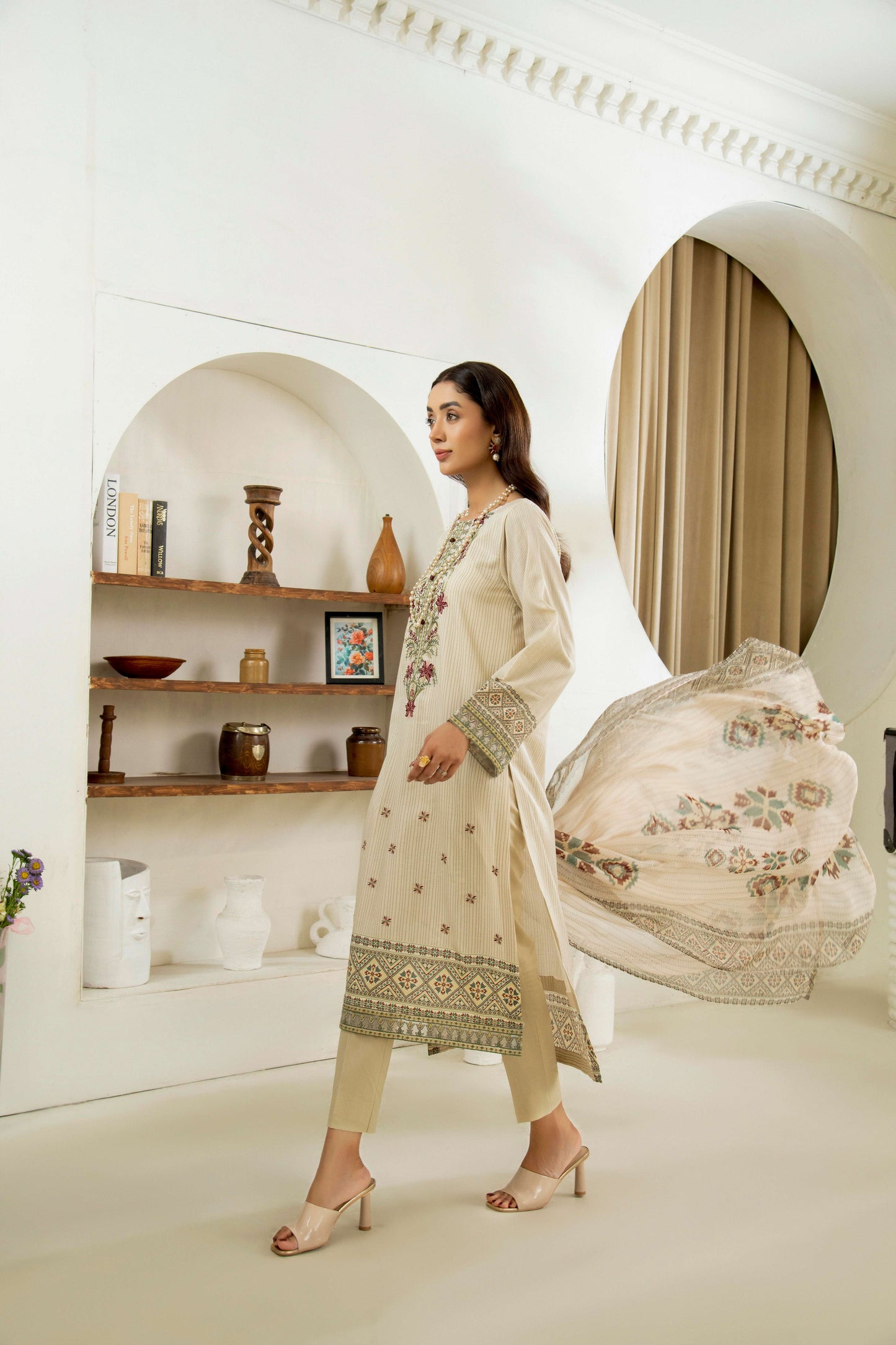 Embroidered kurta paired with a light dupatta
