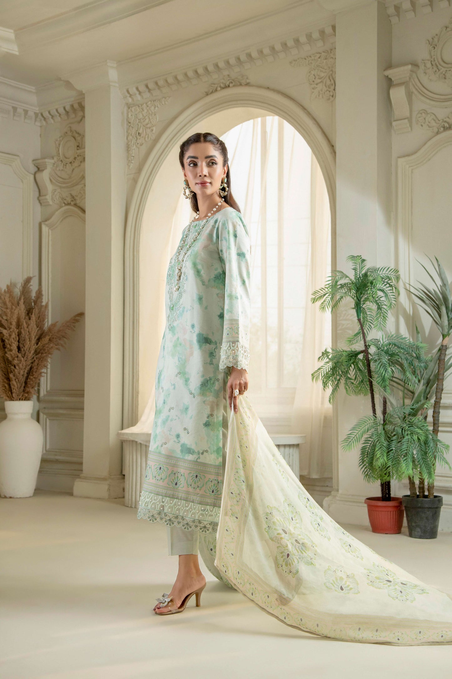  Embroidered kurta styled with patterned dupatta
