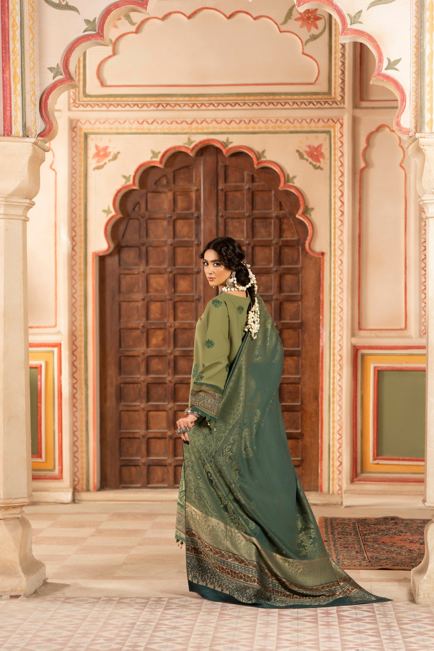 Traditional unstitched Dhanak shirt detailed with embroidery and paired with wool shawl.