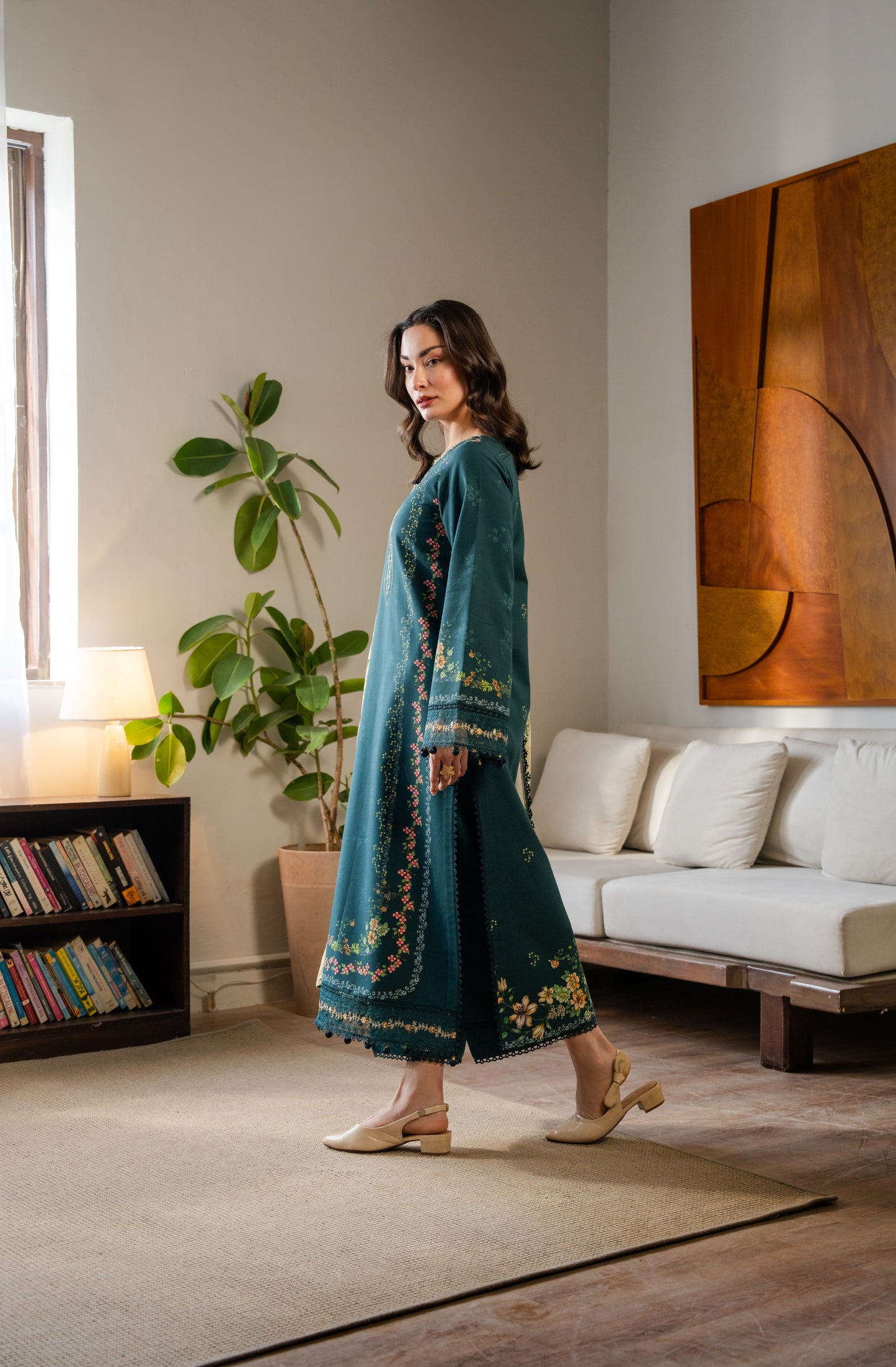 Cozy khaddar winter suit with elegant organza embroidery and a colorful printed dupatta.