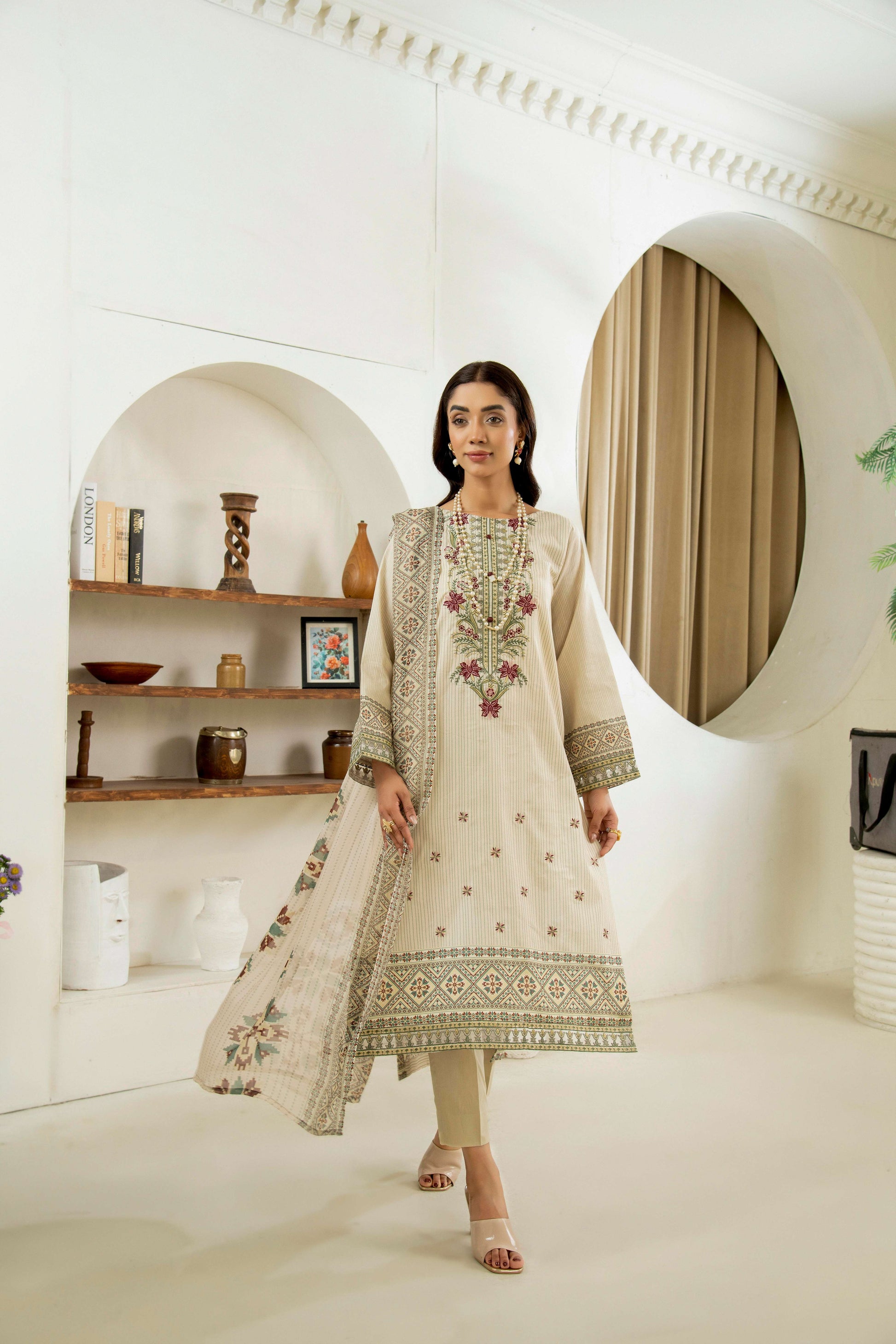  Embroidered kurta styled with lawn trouser