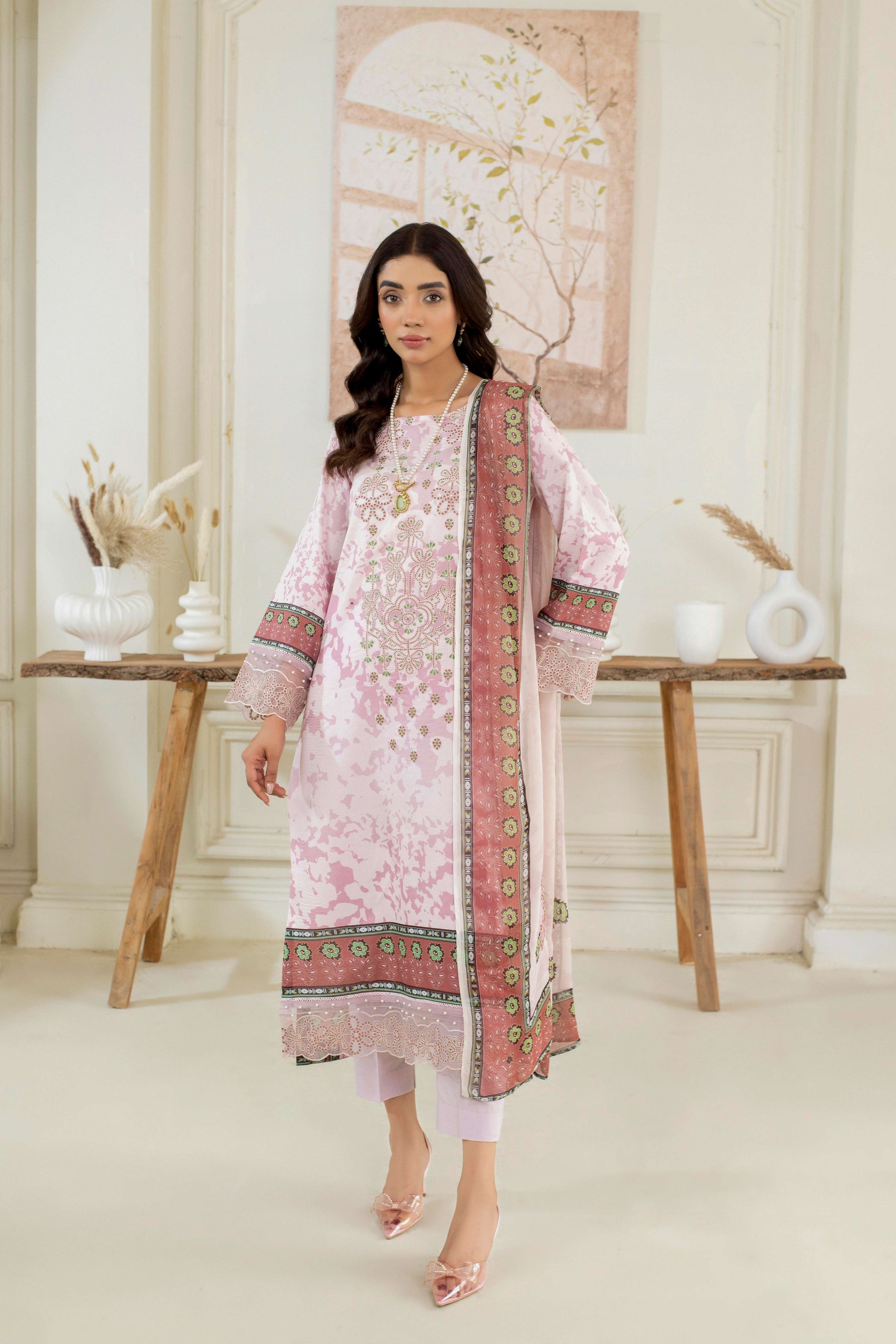  Embroidered lawn shirt with matching dupatta and trouser.