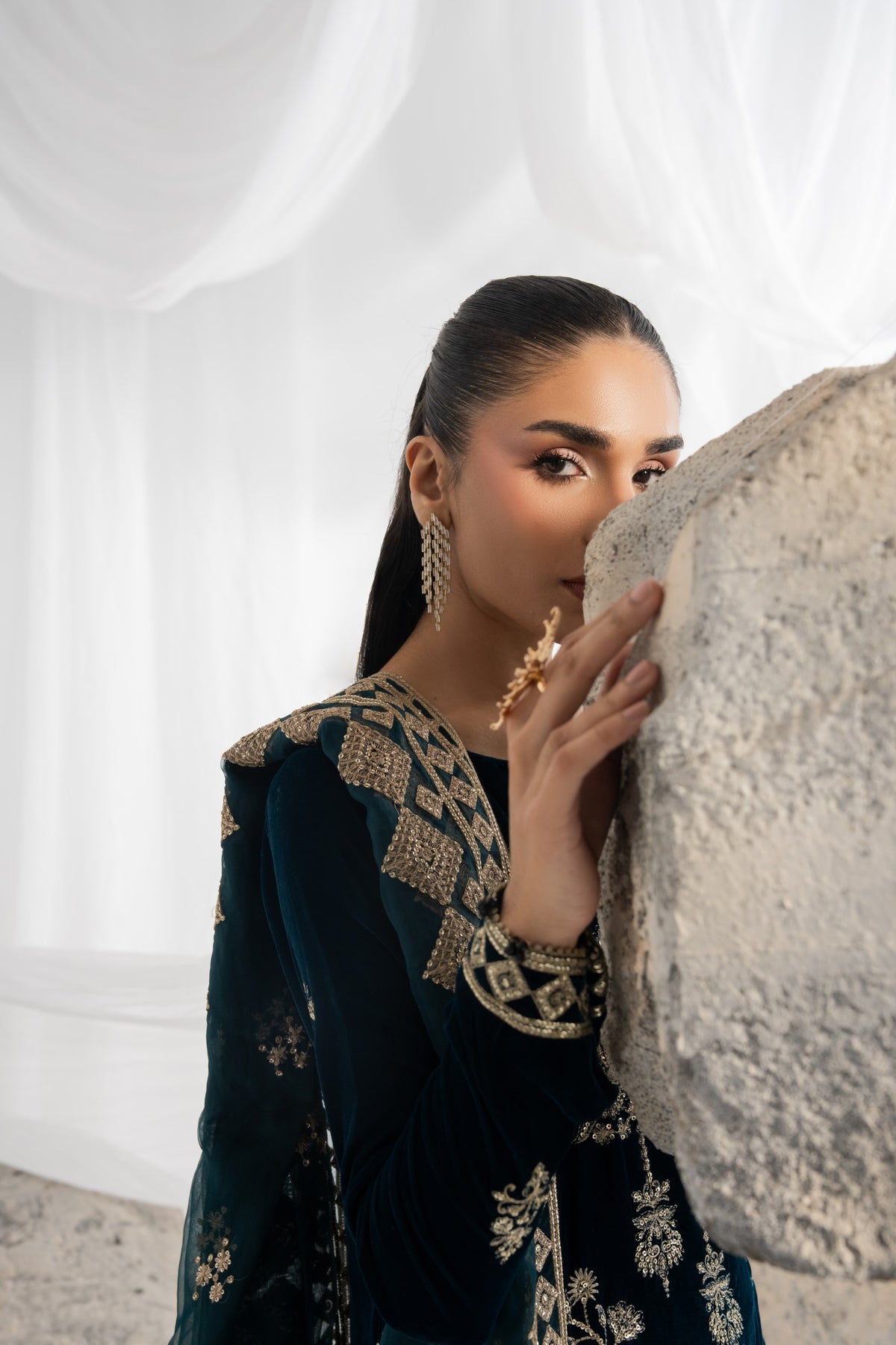 Embroidered long kurta for girls featuring traditional embroidery across the velvet shirt front and back, detailed velvet sleeves and borders, with an embroidered organza dupatta and plain raw silk pants