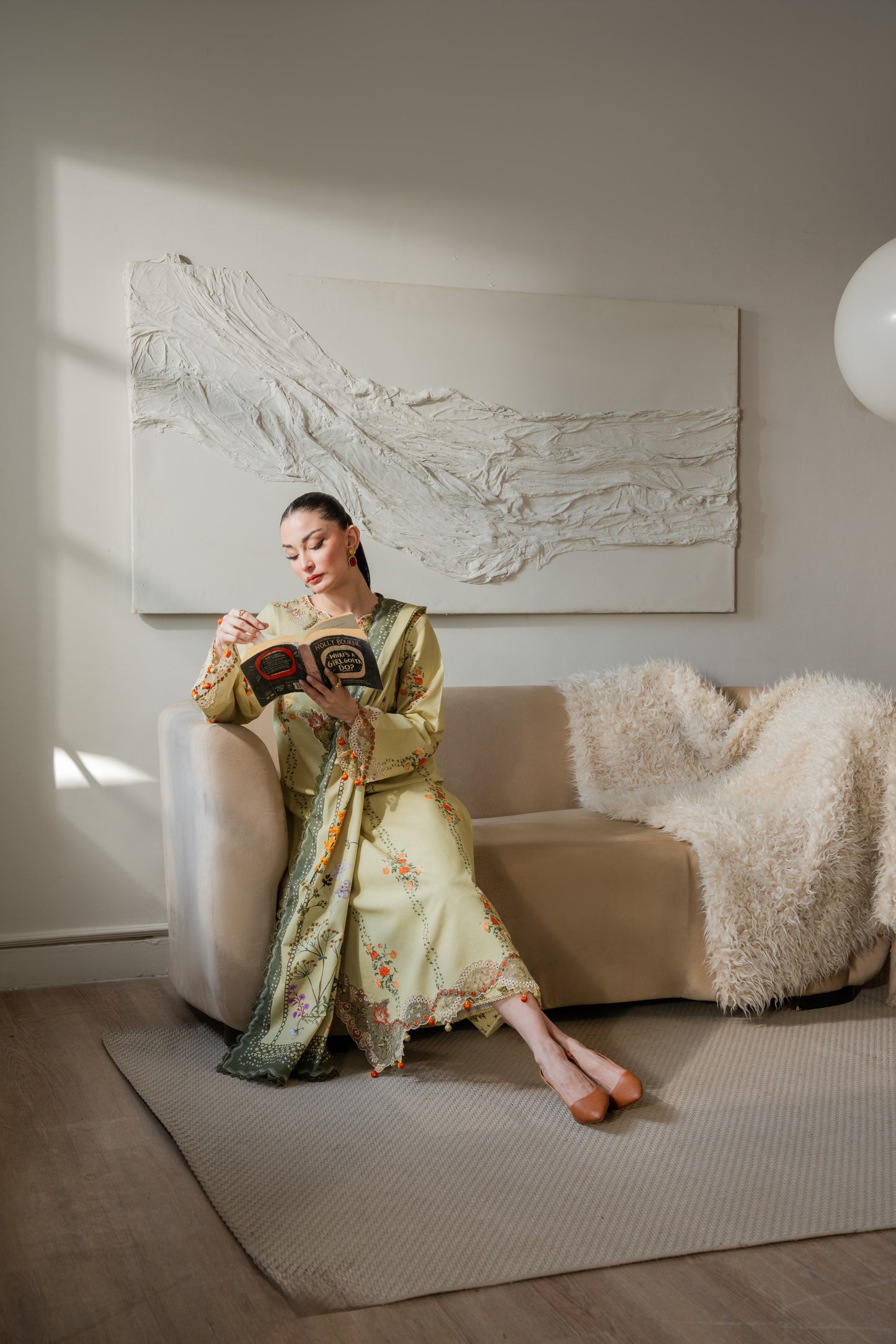 Khaddar winter dress with soft fabric, organza borders, and dyed trousers.