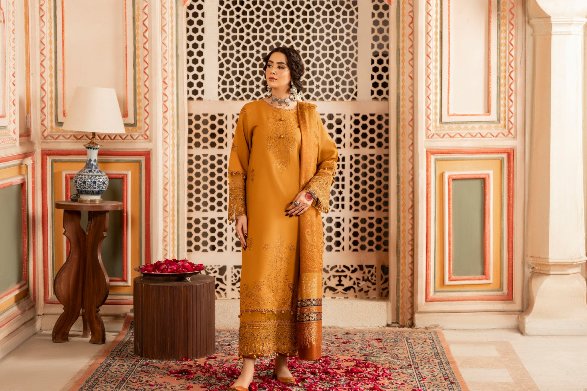 Beautifully crafted embroidered Dhanak shirt with a jacquard woolen shawl and simple Dhanak trouser.