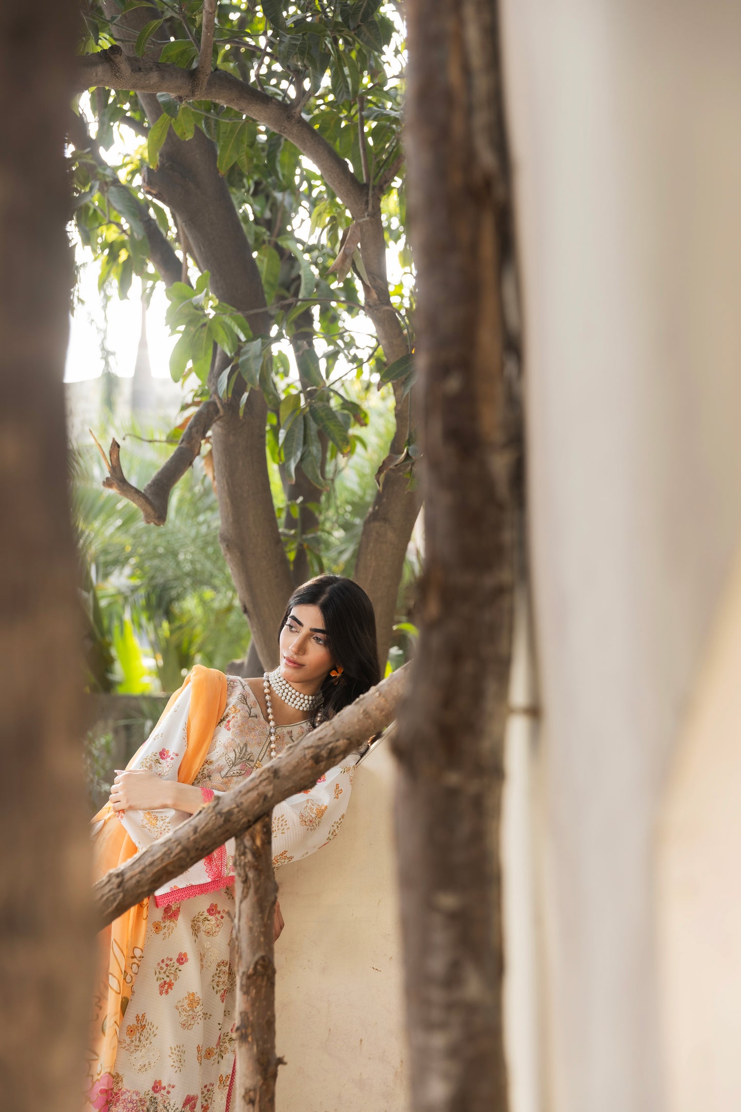 Embroidered front lawn shirt, printed chiffon dupatta, and plain cotton trouser for casual eastern wear
