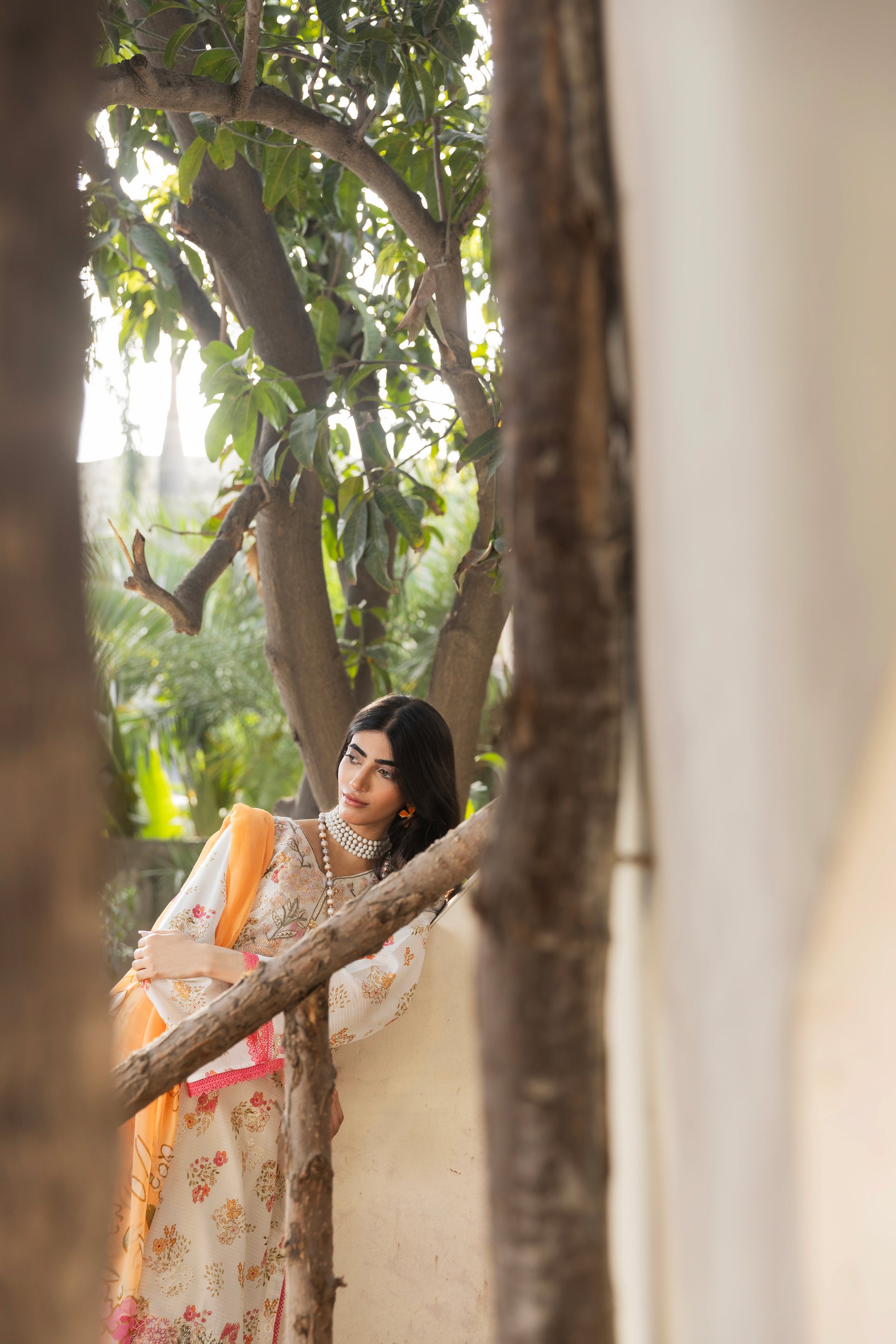 Embroidered front lawn shirt, printed chiffon dupatta, and plain cotton trouser for casual eastern wear