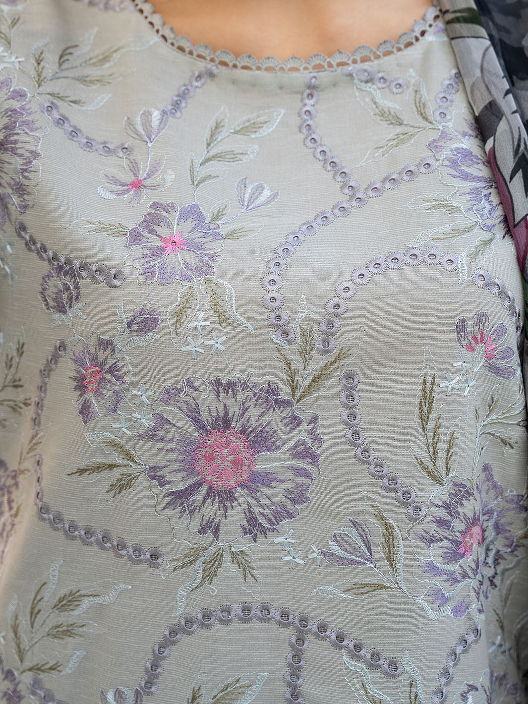 Exclusive embroidered lawn suit with chiffon dupatta and plain karandi trouser