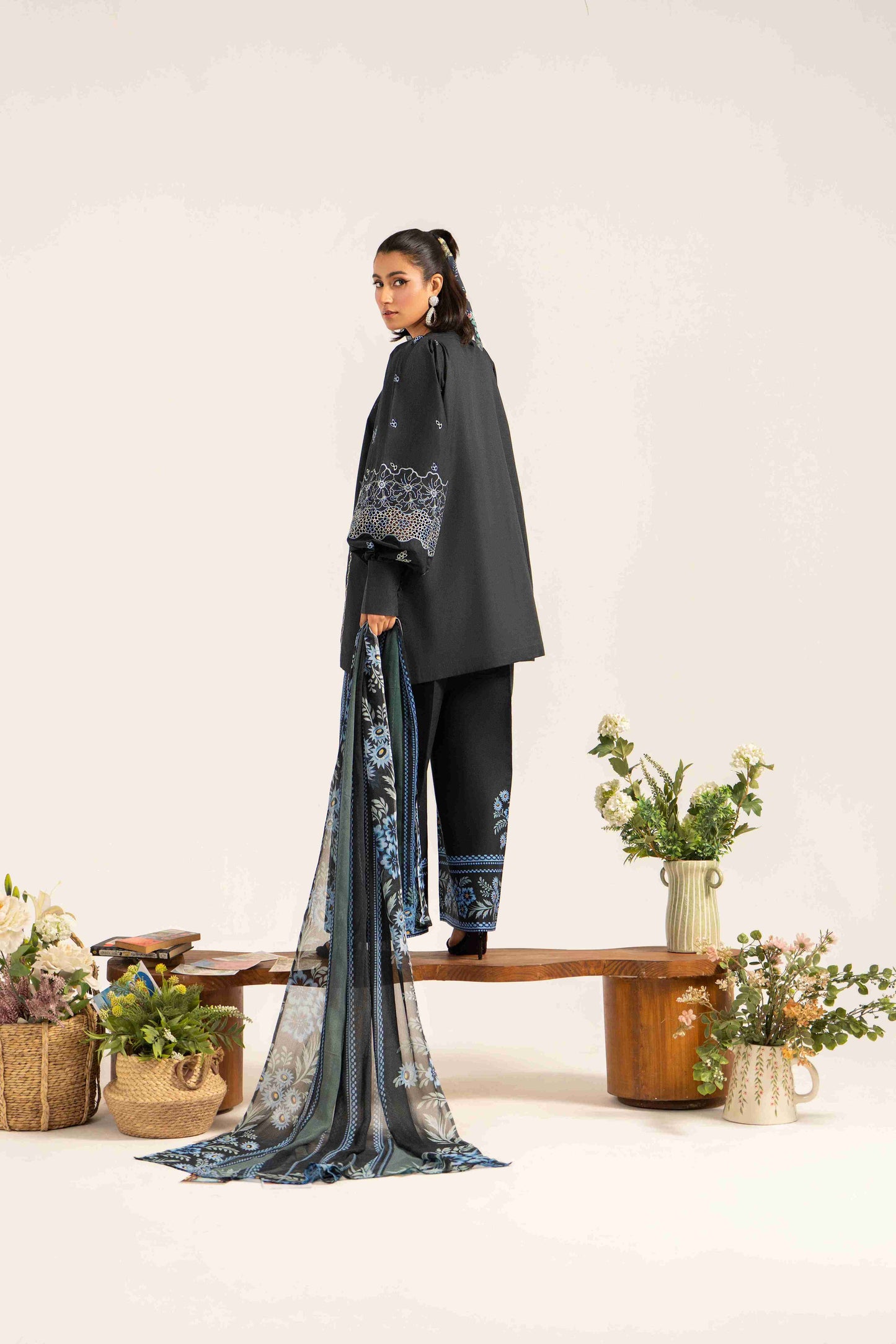 Embroidered lawn shirt with organza detail paired with chiffon dupatta and cotton trouser.
