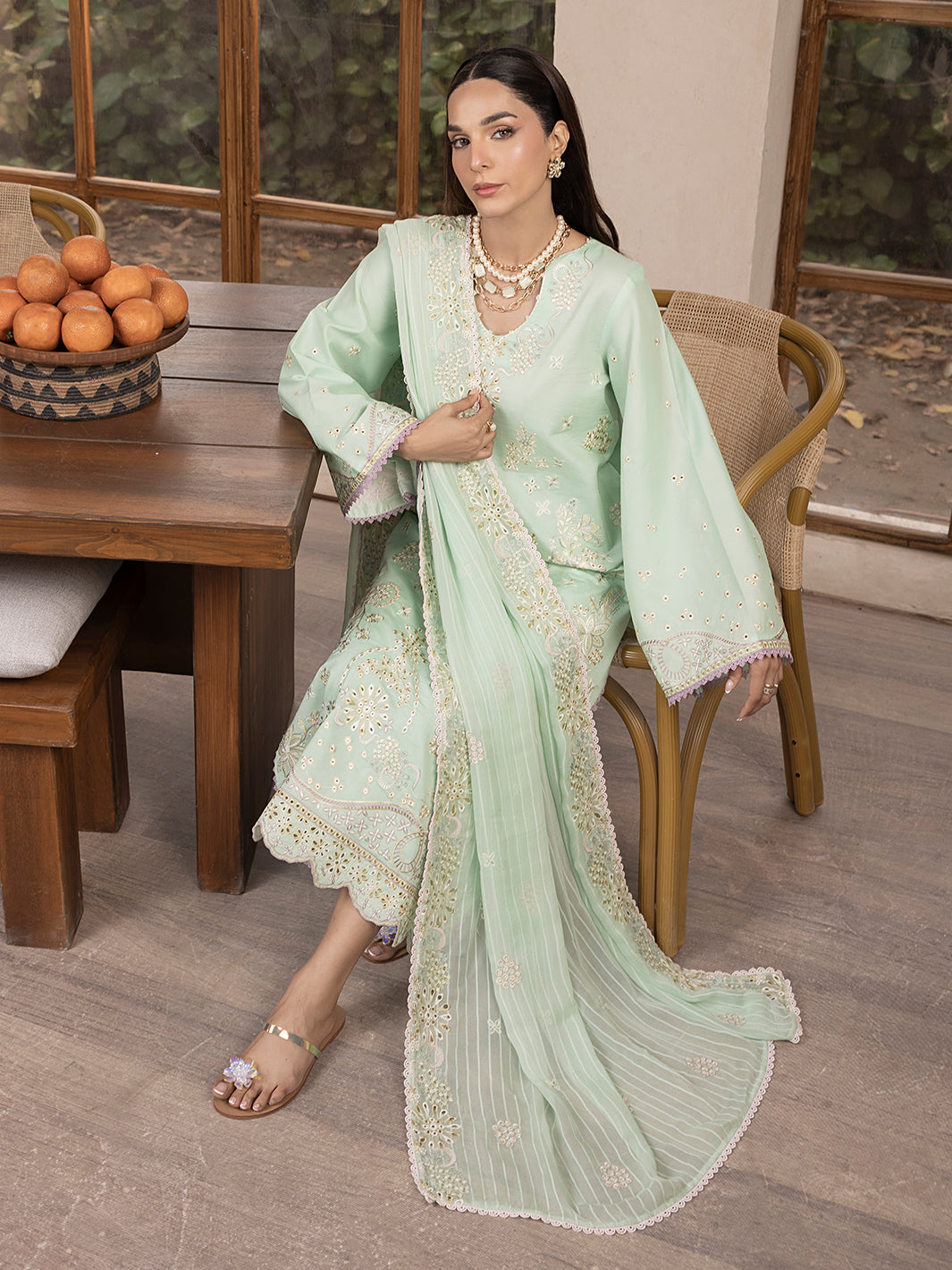 Unstitched embroidered lawn suit with patches, styled for eastern formal and casual wear