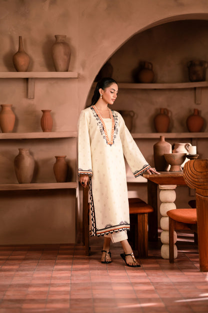 Premium khaddar fabric suit styled for weddings, combining comfort and elegance