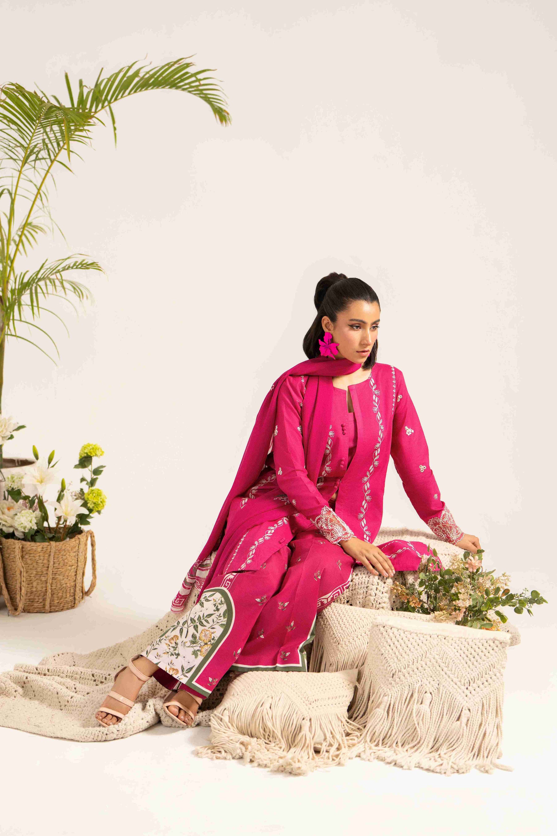 Fancy embroidered lawn shirt styled with chiffon printed dupatta and soft cotton trouser.