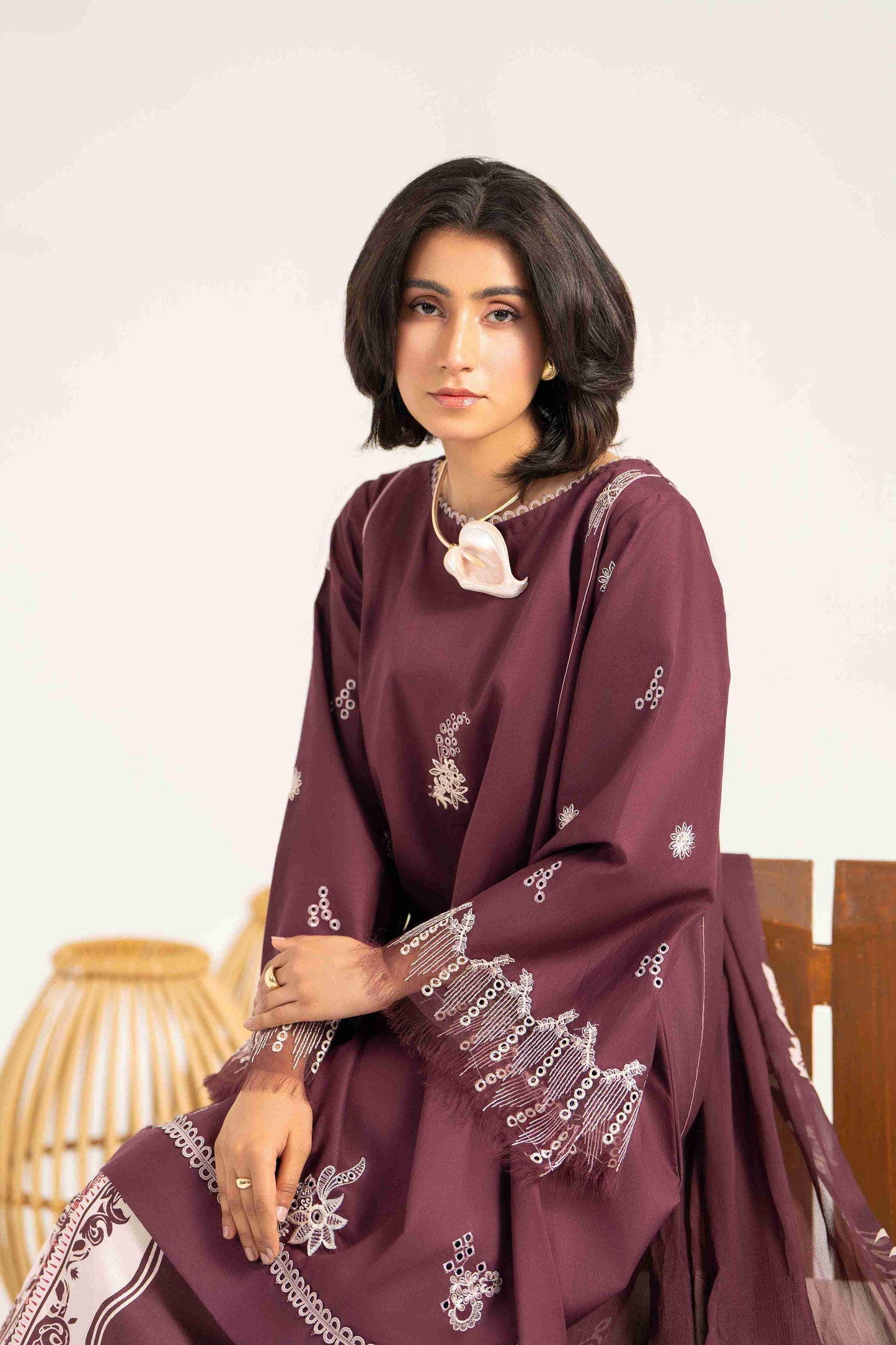  Fancy embroidered lawn shirt matched with chiffon dupatta and soft cotton trouser.