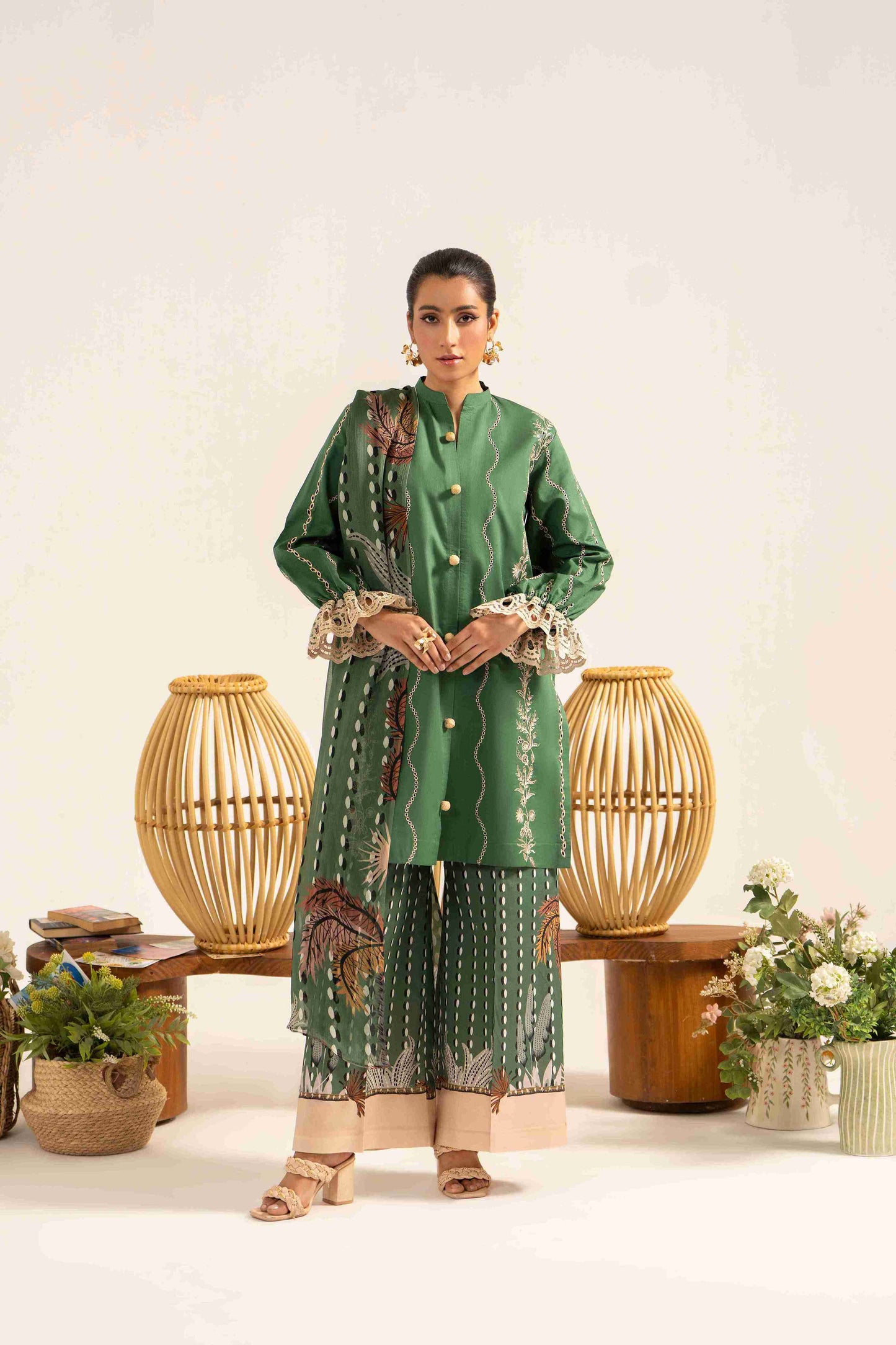  Fancy embroidered lawn shirt styled with chiffon printed dupatta and cotton trouser.