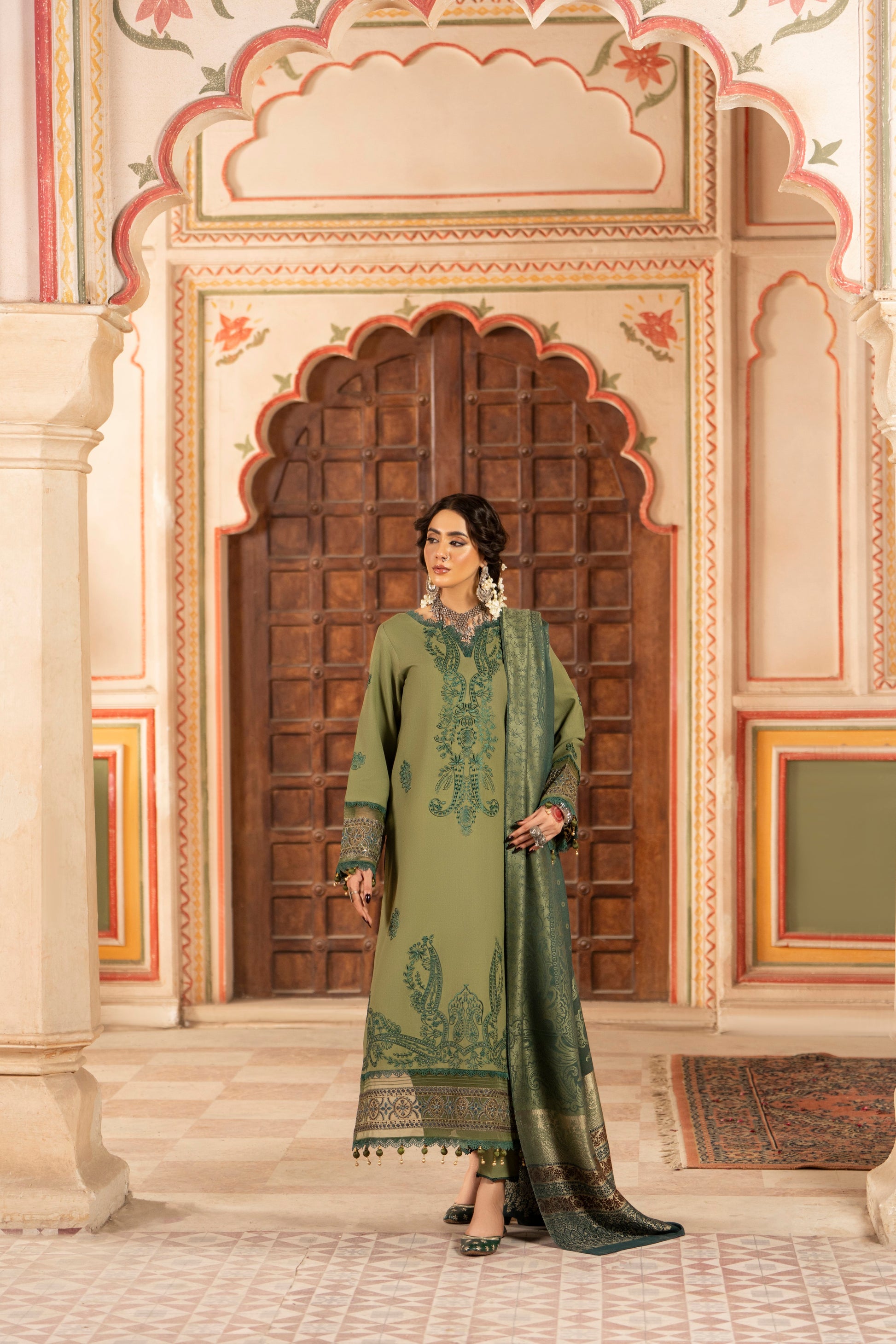 Elegant winter embroidered Dhanak shirt matched with woolen shawl and trouser for formal wear.