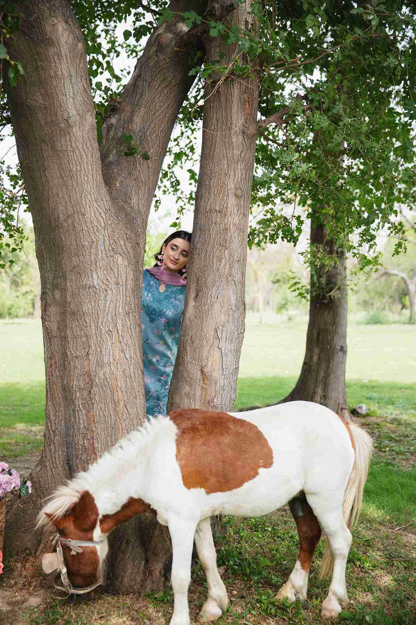 Embroidered lawn dress with chiffon dupatta and plain cotton trouser.
