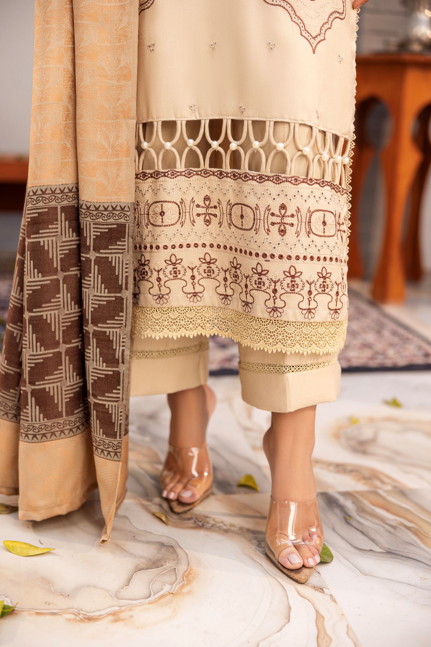 Soft Dhanak suit enhanced with delicate organza accents