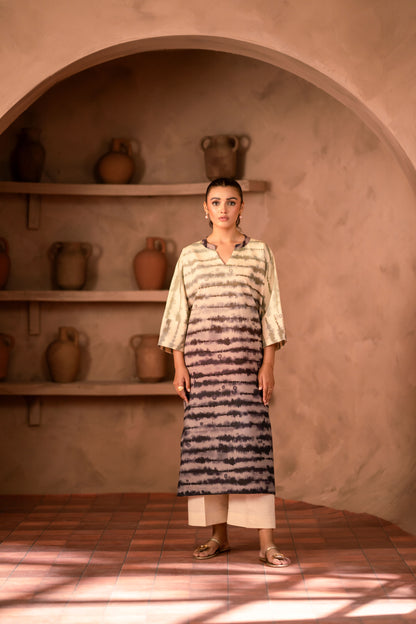 Women’s embroidered khaddar fabric outfit for winter season