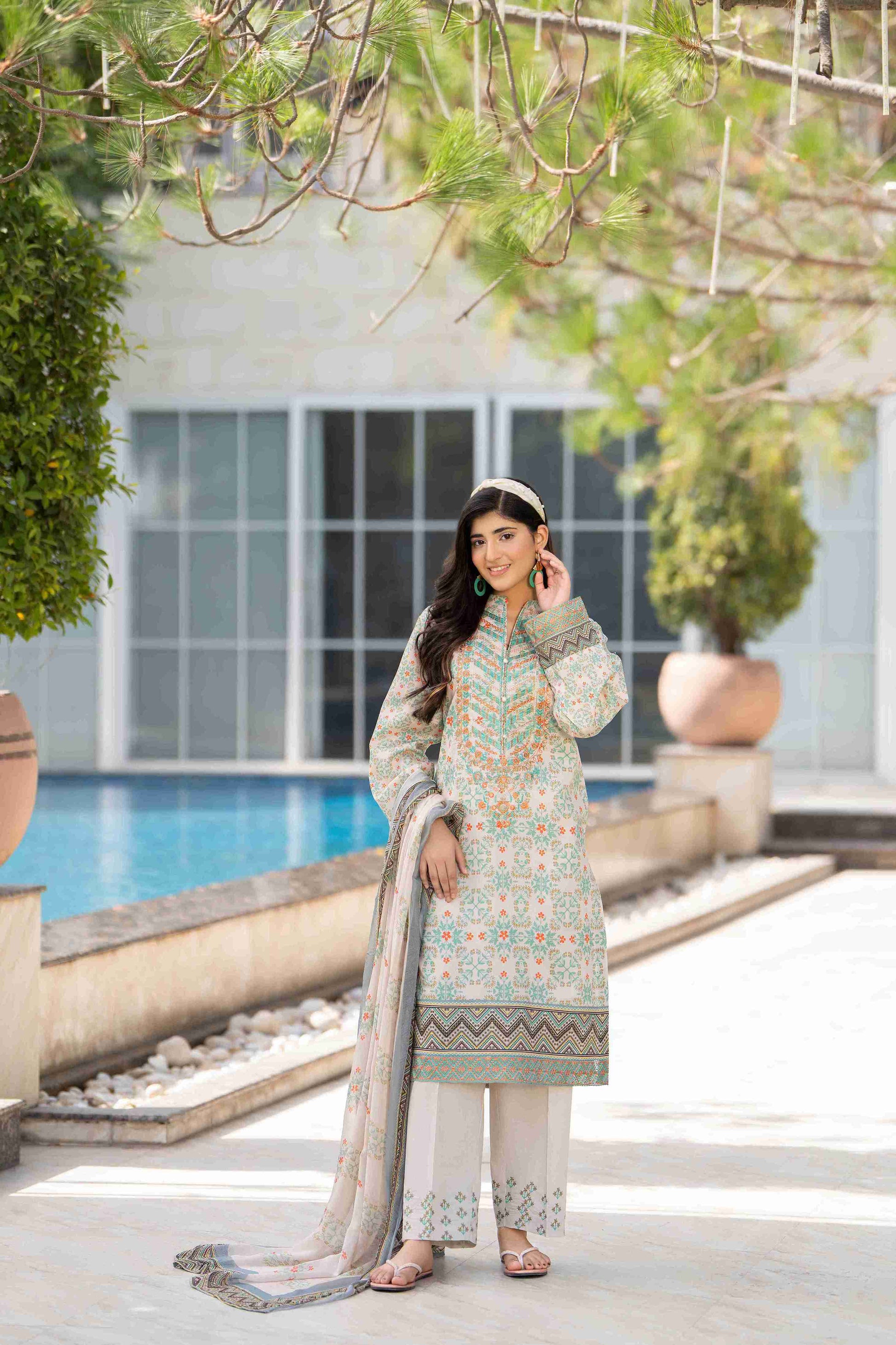 Pastel embroidered kurta crafted in premium lawn with chiffon dupatta and cotton trouser
