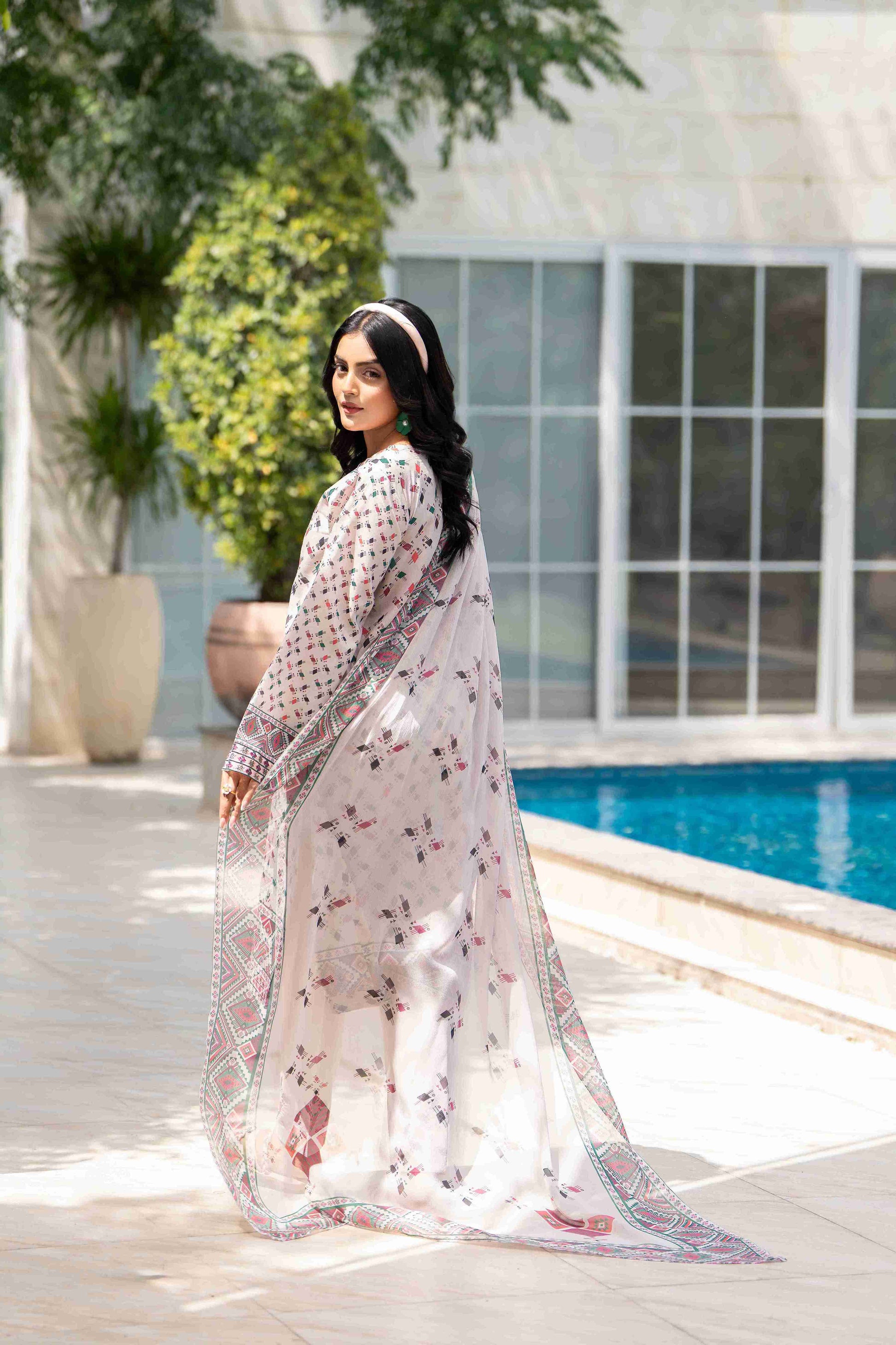 Unique embroidered lawn shirt paired with chiffon dupatta and pure cotton trouser