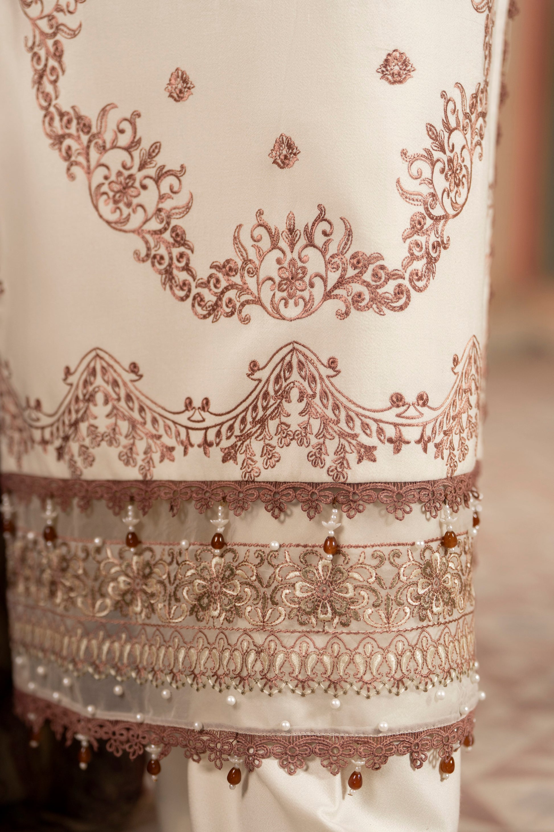 Rich jacquard wool shawl paired with delicate embroidered Dhanak shirt and plain trousers.