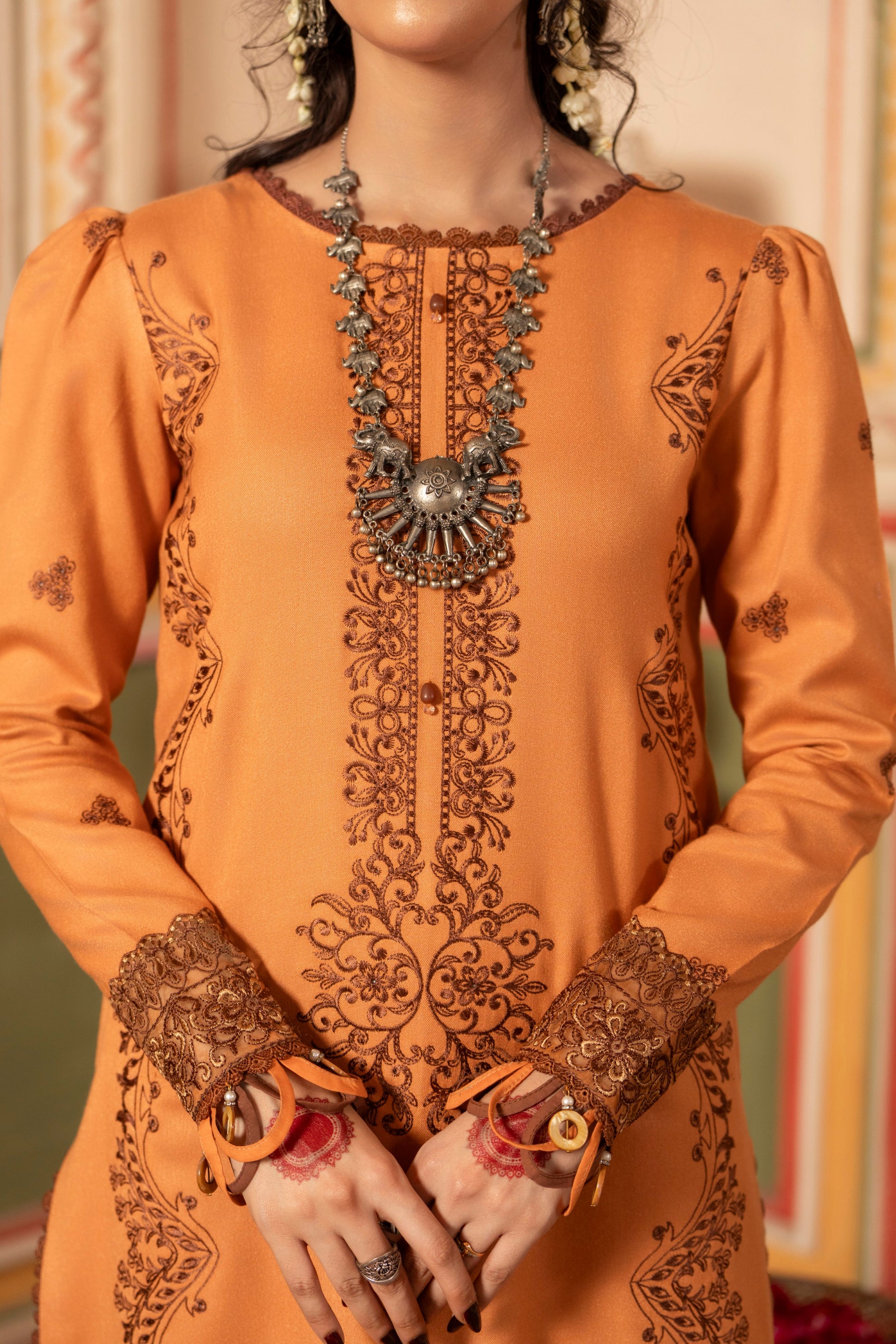 Party-ready embroidered Dhanak winter dress with elegant wool shawl.