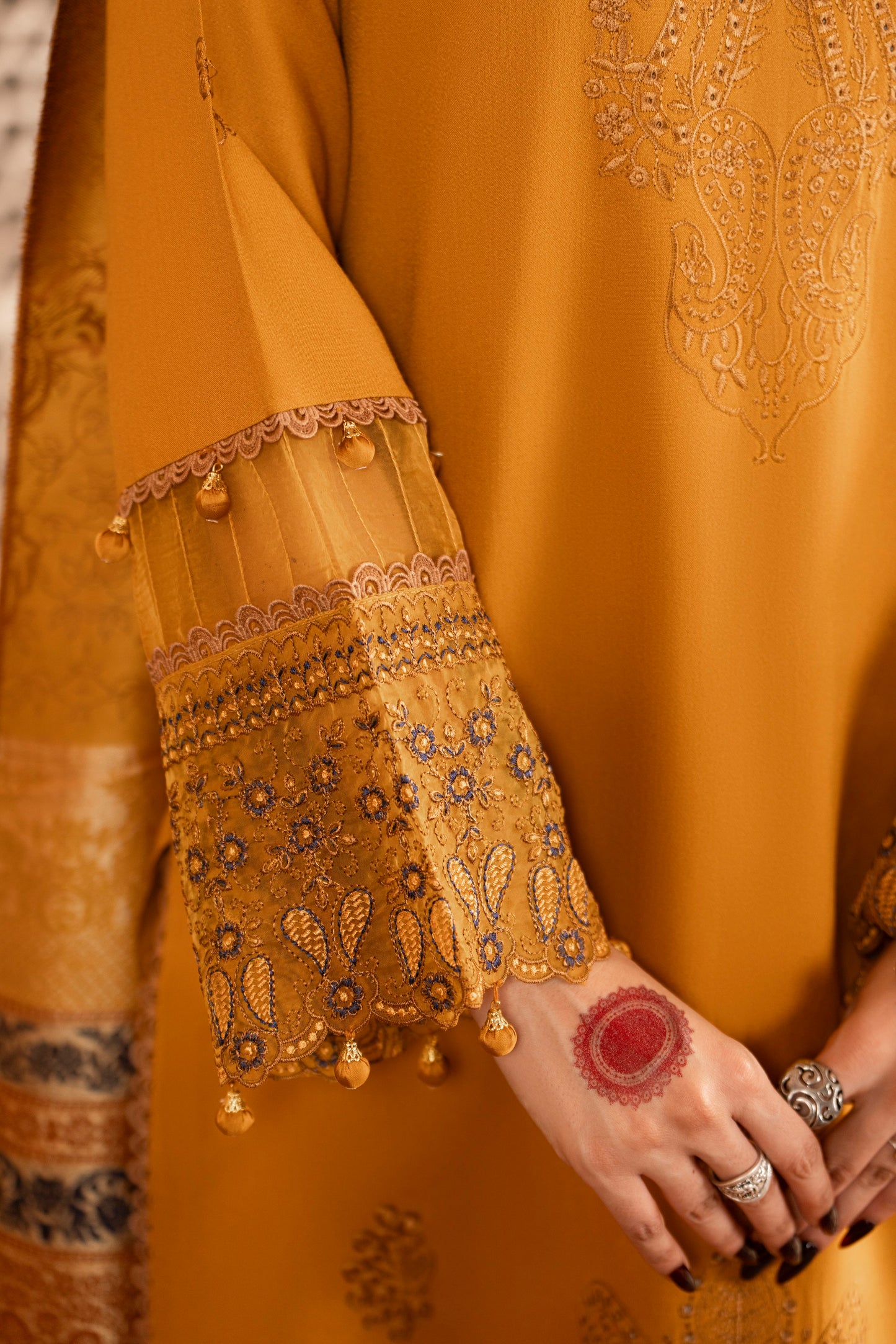 Elegant 3PC unstitched set featuring a jacquard wool shawl paired with embroidered Dhanak shirt and trouser.