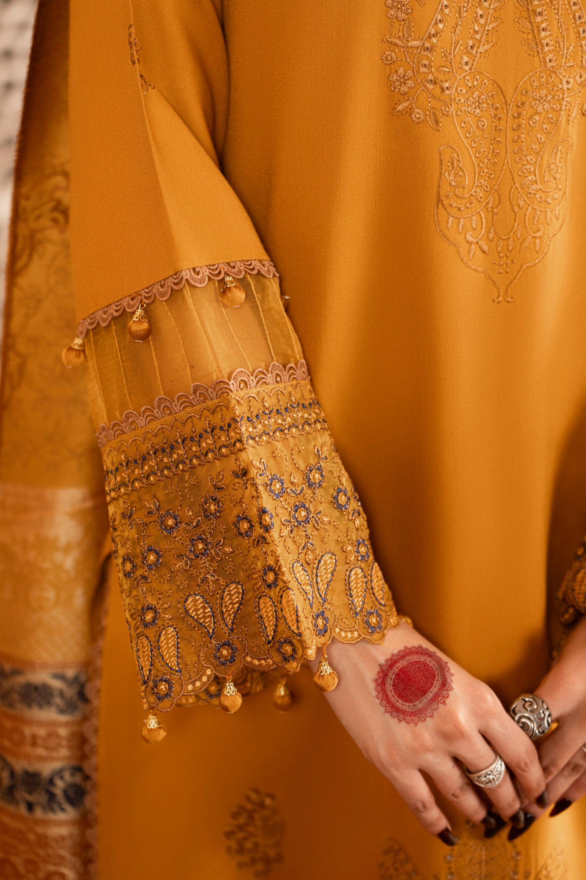 Elegant 3PC unstitched set featuring a jacquard wool shawl paired with embroidered Dhanak shirt and trouser.