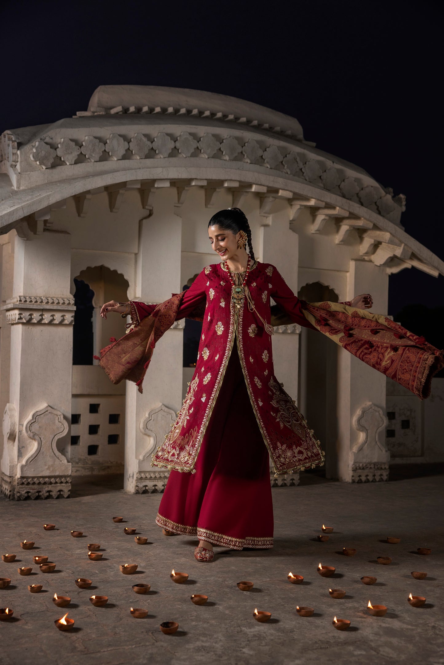 A set featuring a textured handwoven shawl over a simple embroidered Marina suit.