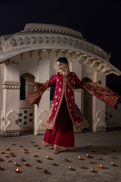 A set featuring a textured handwoven shawl over a simple embroidered Marina suit.