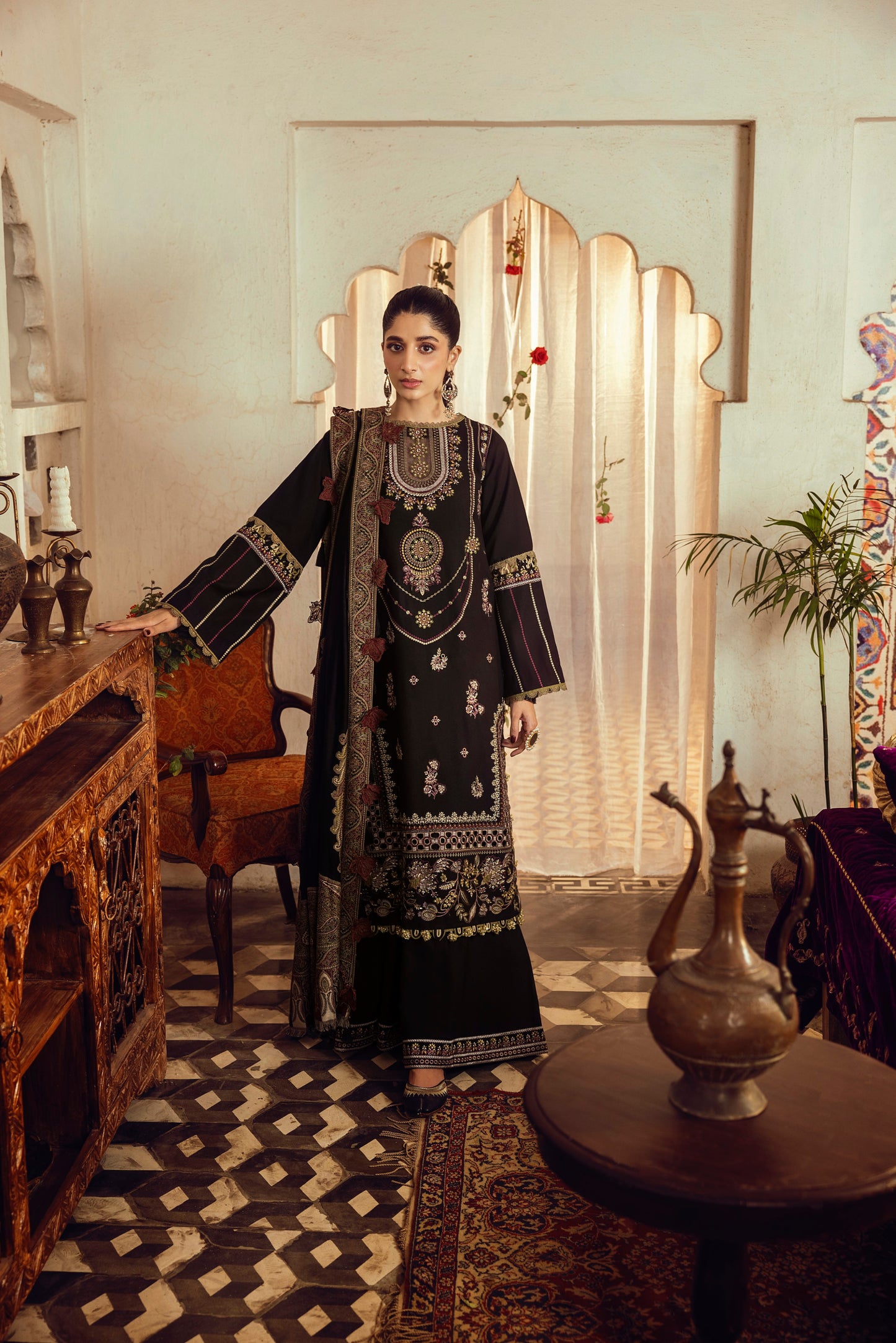 A prism-toned outfit with Marina wool detailing and a colorful handwoven shawl from Kashmir.