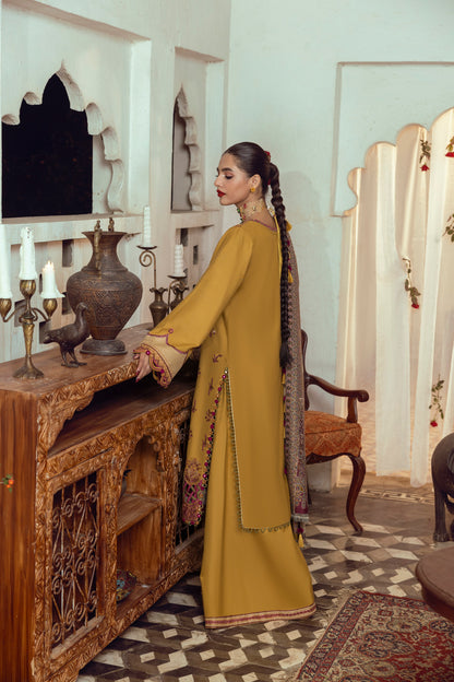 A wool-crafted winter suit merging fine Marina work with a skillfully woven Kashmiri shawl.