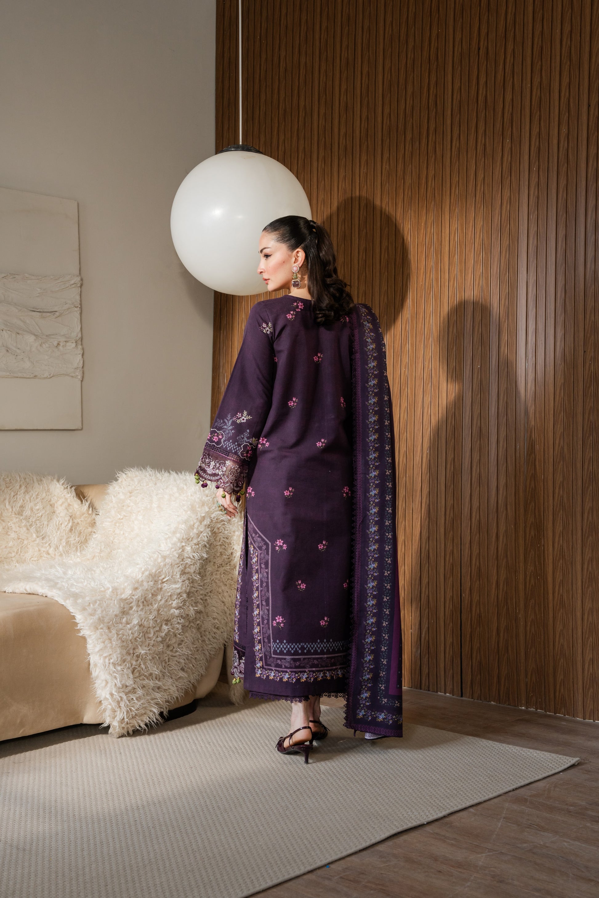 Embroidered khaddar winter suit with organza borders and printed dupatta for gatherings.
