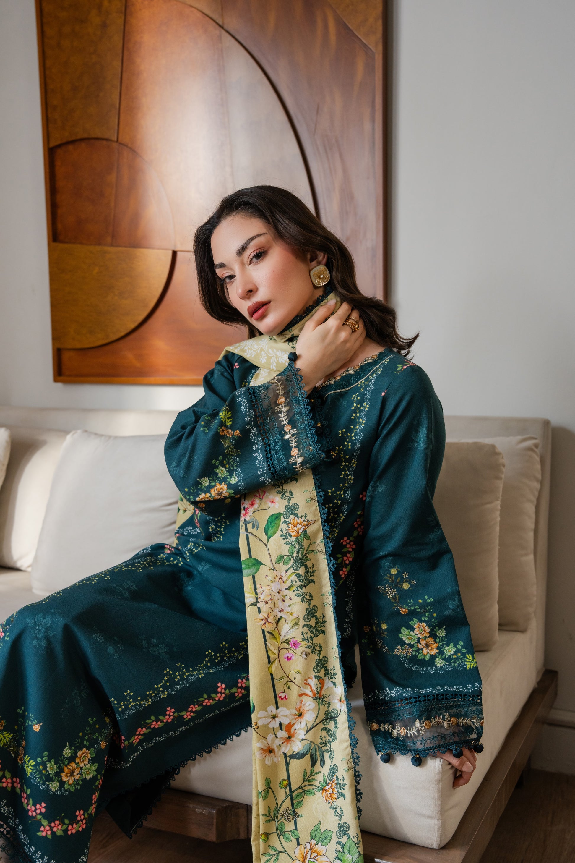 Easy-to-wear printed khaddar outfit with embroidered organza neckline and dyed trouser.