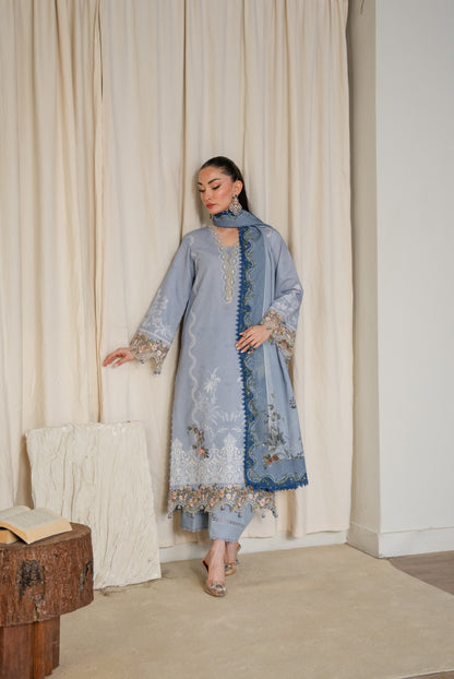 Winter suit with organza neckline and daman embroidery plus dyed trousers.