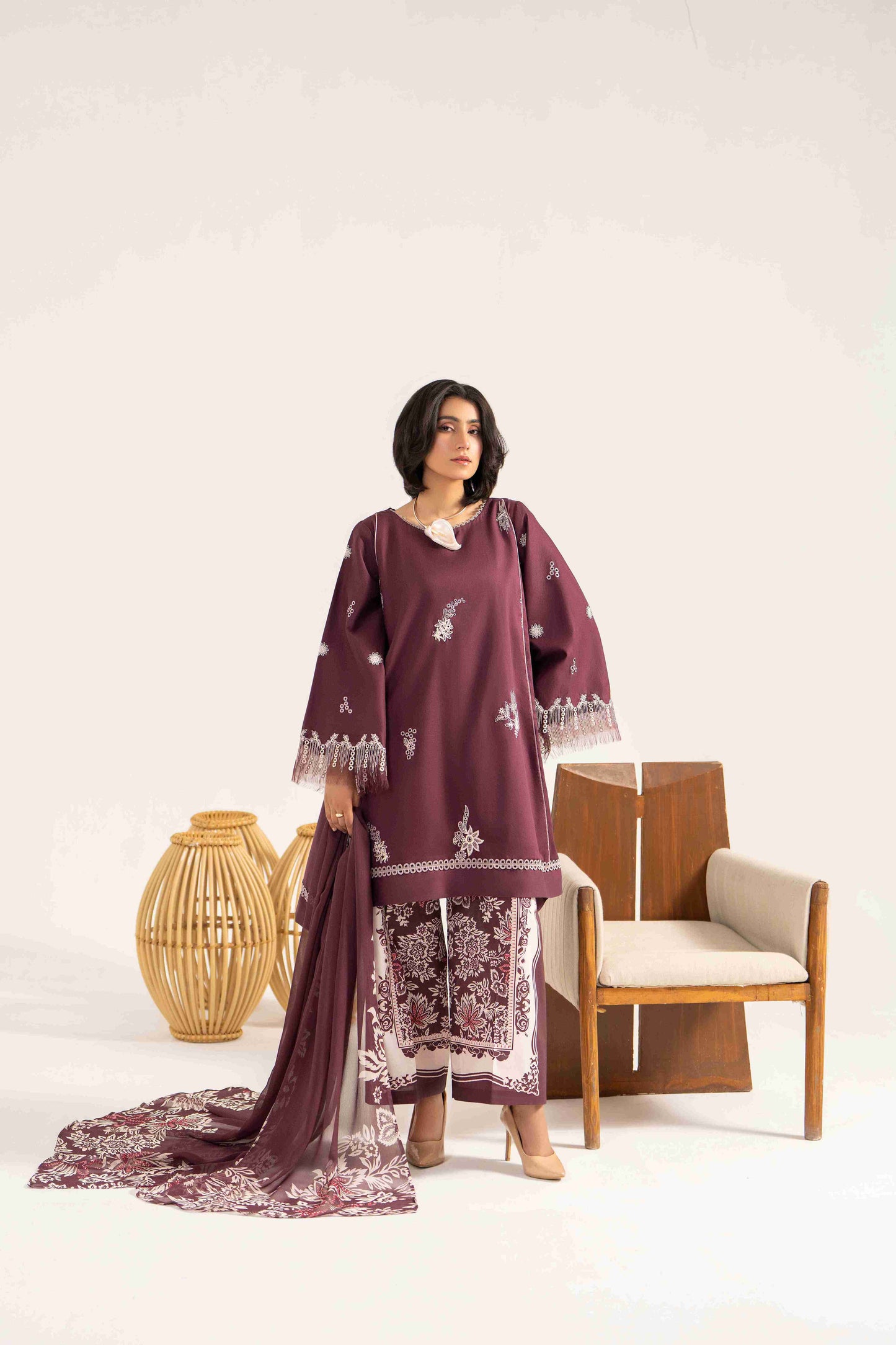  Embroidered lawn shirt with organza detail styled with chiffon dupatta and trouser.