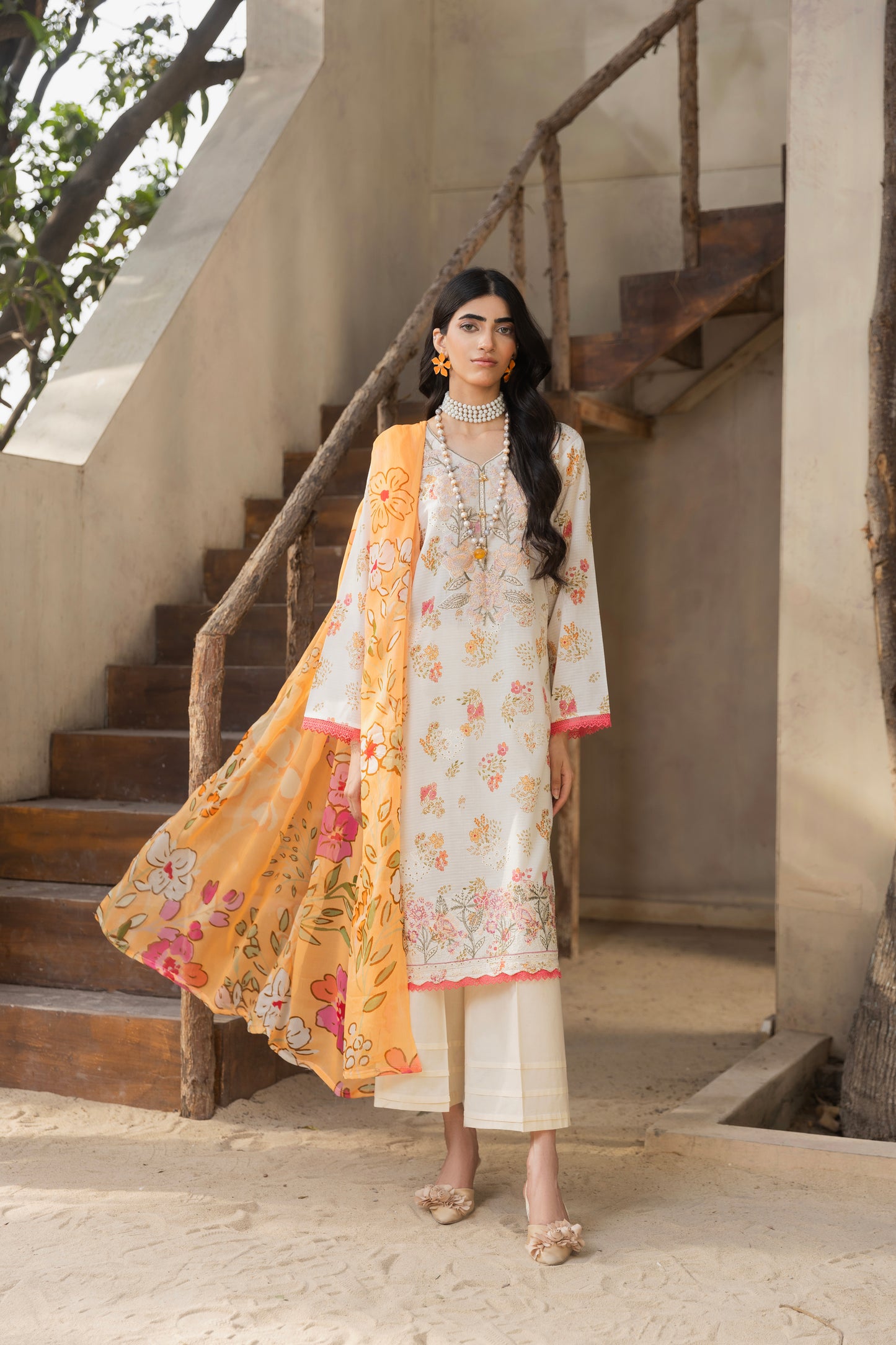  Lawn suit with embroidered shirt, chiffon dupatta, and cotton trouser suitable for light wedding wear