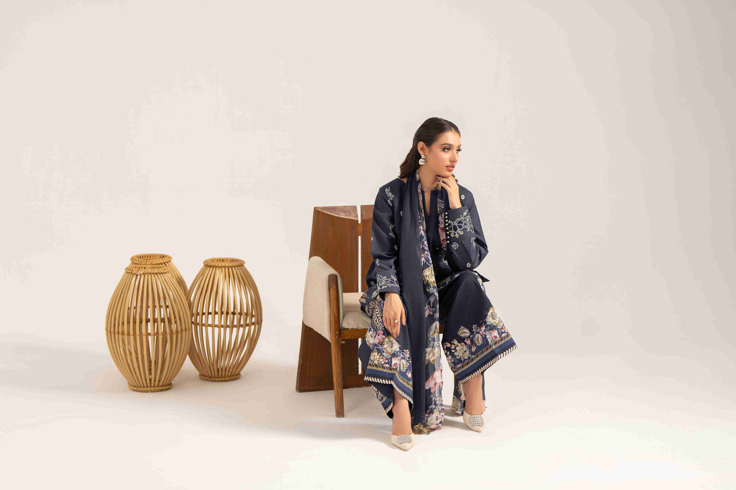  Luxury embroidered lawn shirt designed with chiffon dupatta and plain cotton trouser.