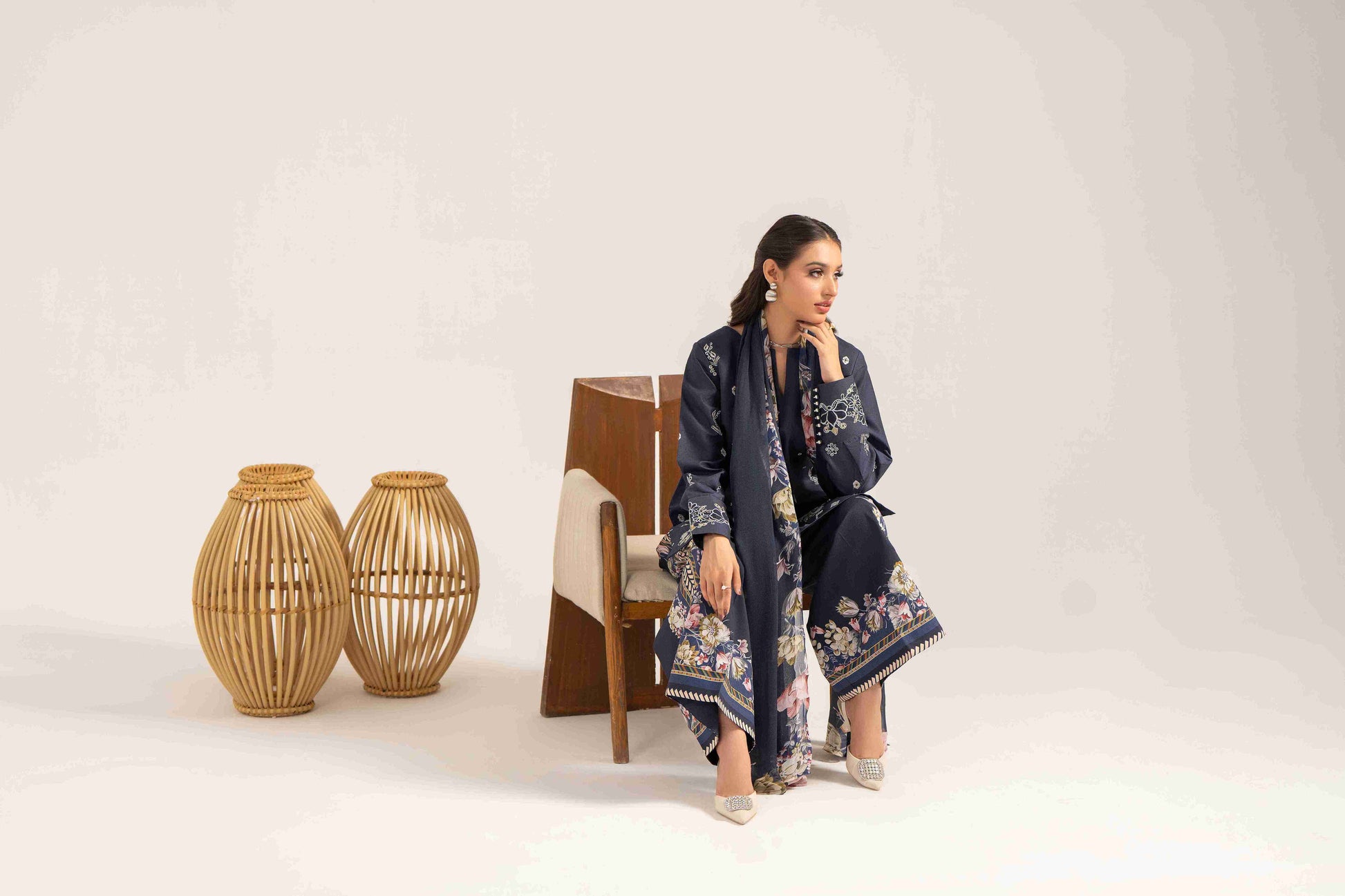  Luxury embroidered lawn shirt designed with chiffon dupatta and plain cotton trouser.