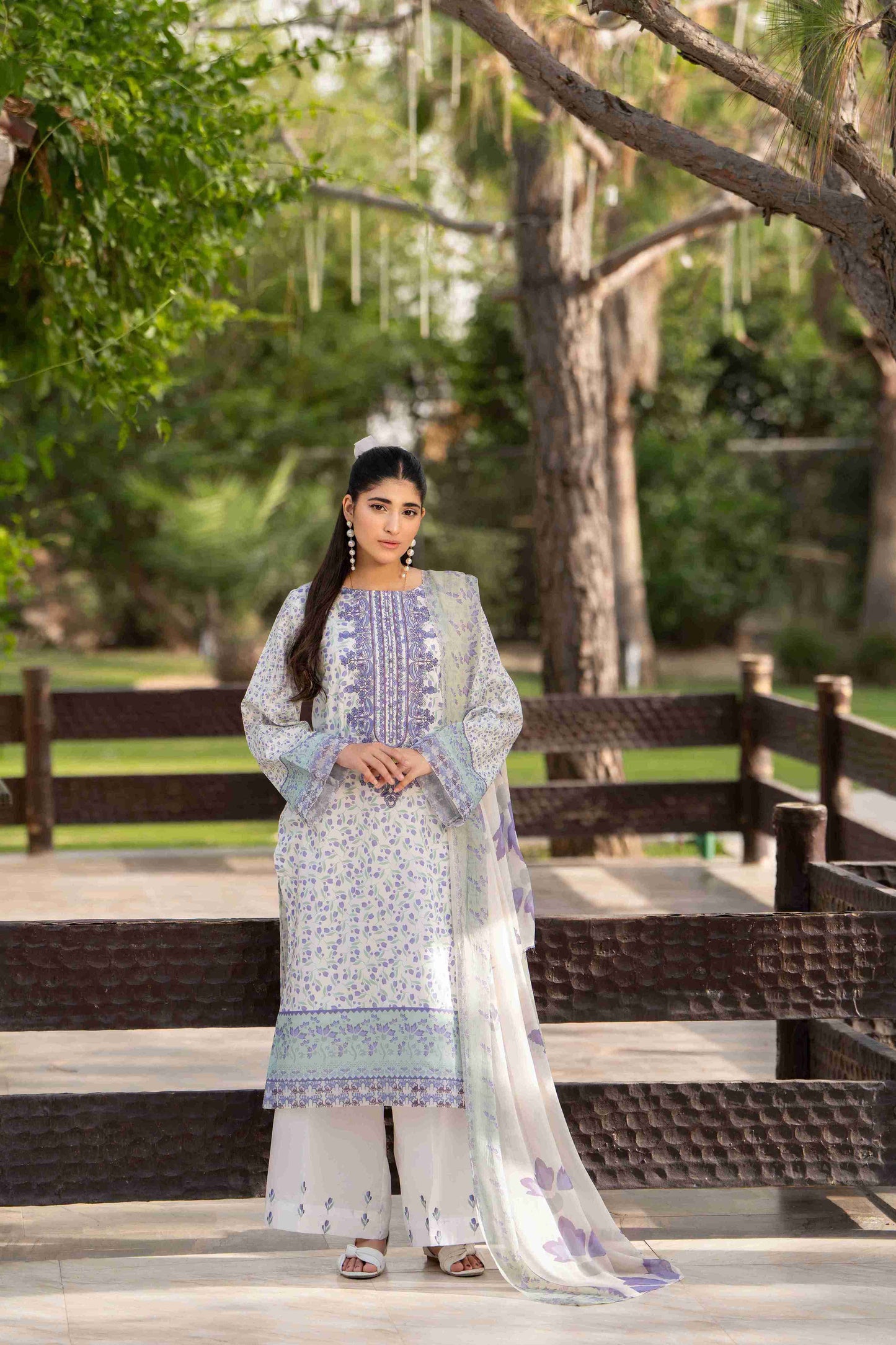 Embroidered neckline kurta paired with soft chiffon dupatta and breathable cotton trouser