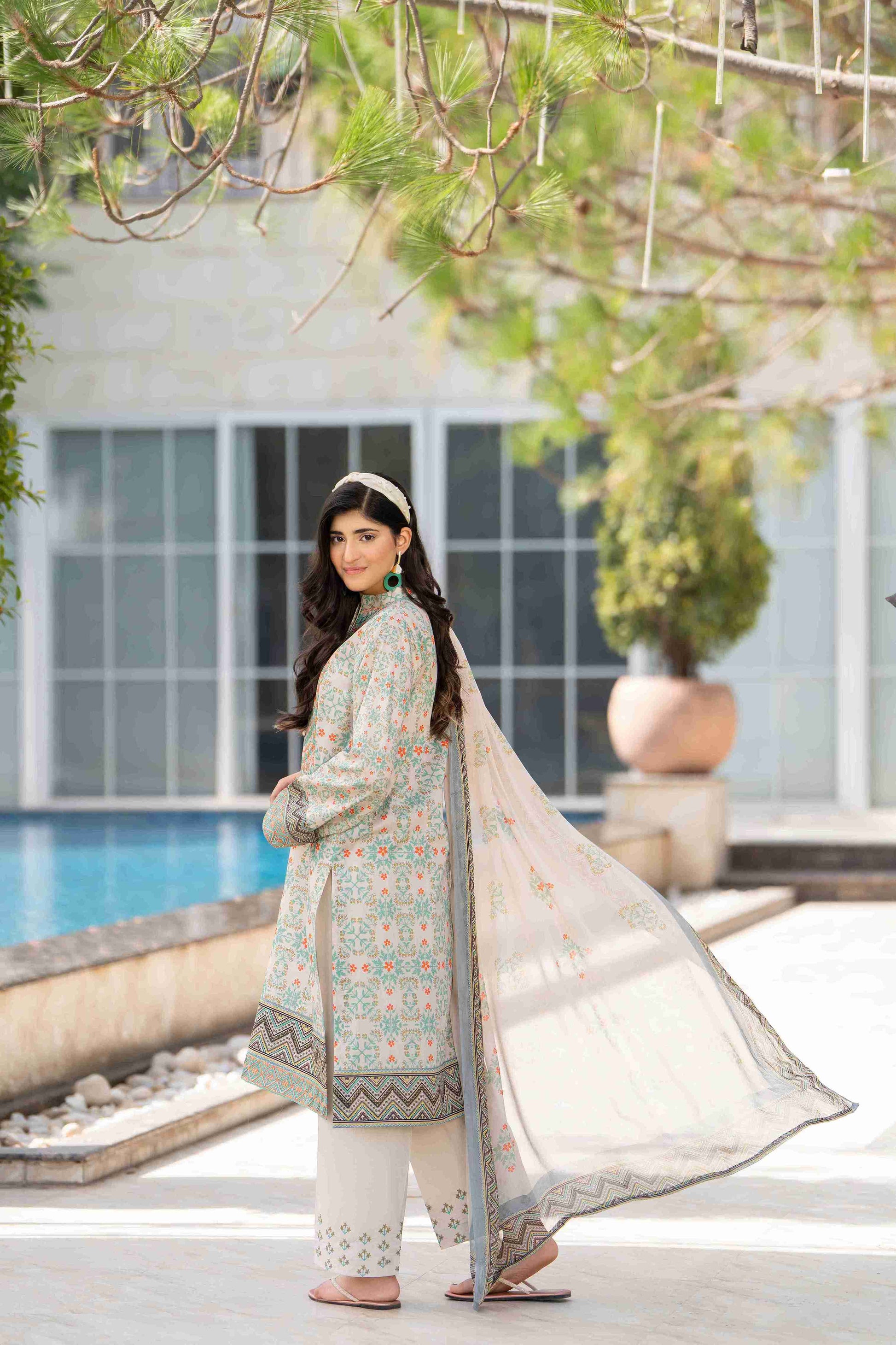 Richly designed embroidered neckline kurta with chiffon dupatta and cotton trouser