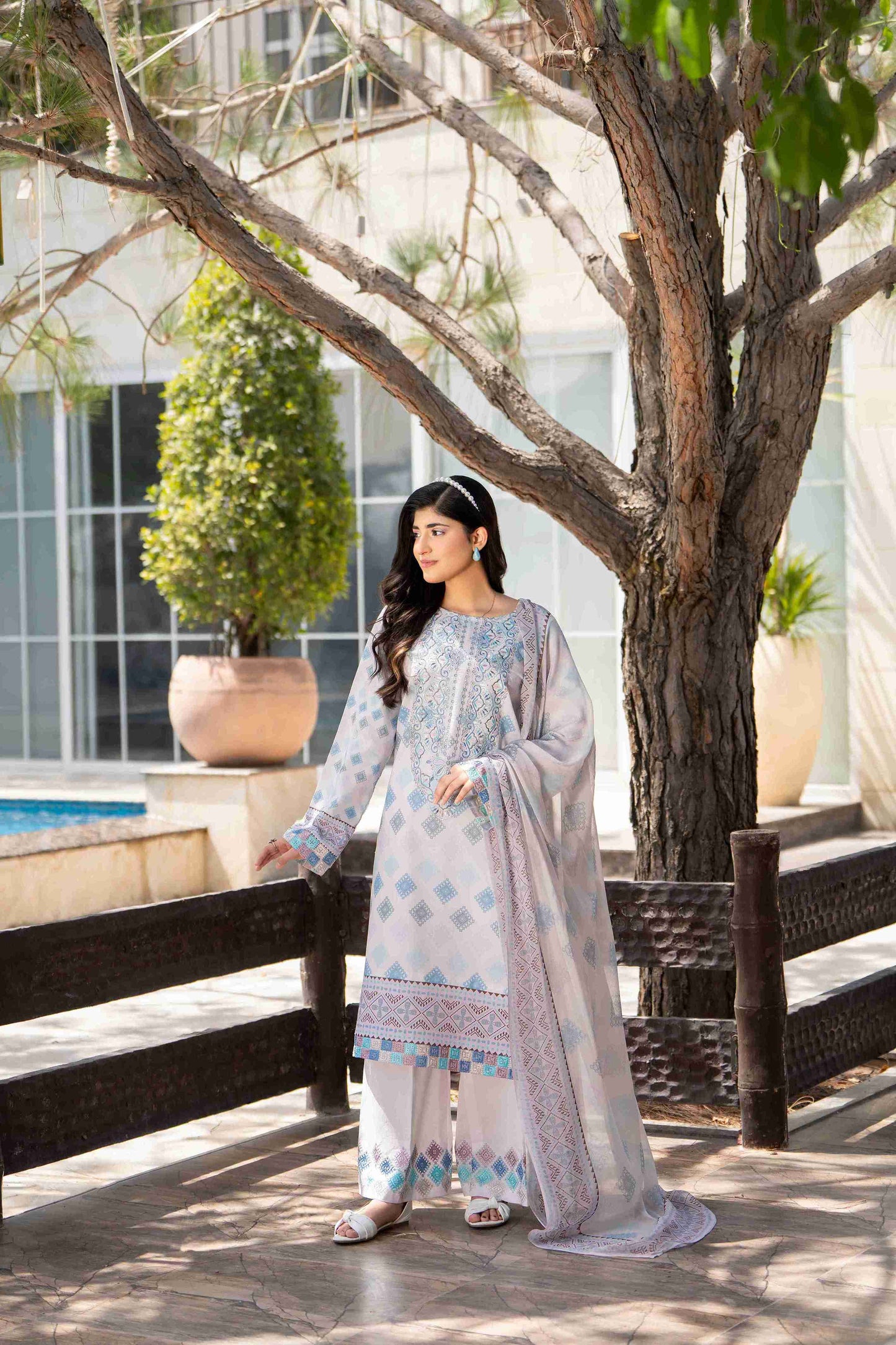 Branded lawn kurta with embroidered neckline, chiffon dupatta, and breathable cotton trouser