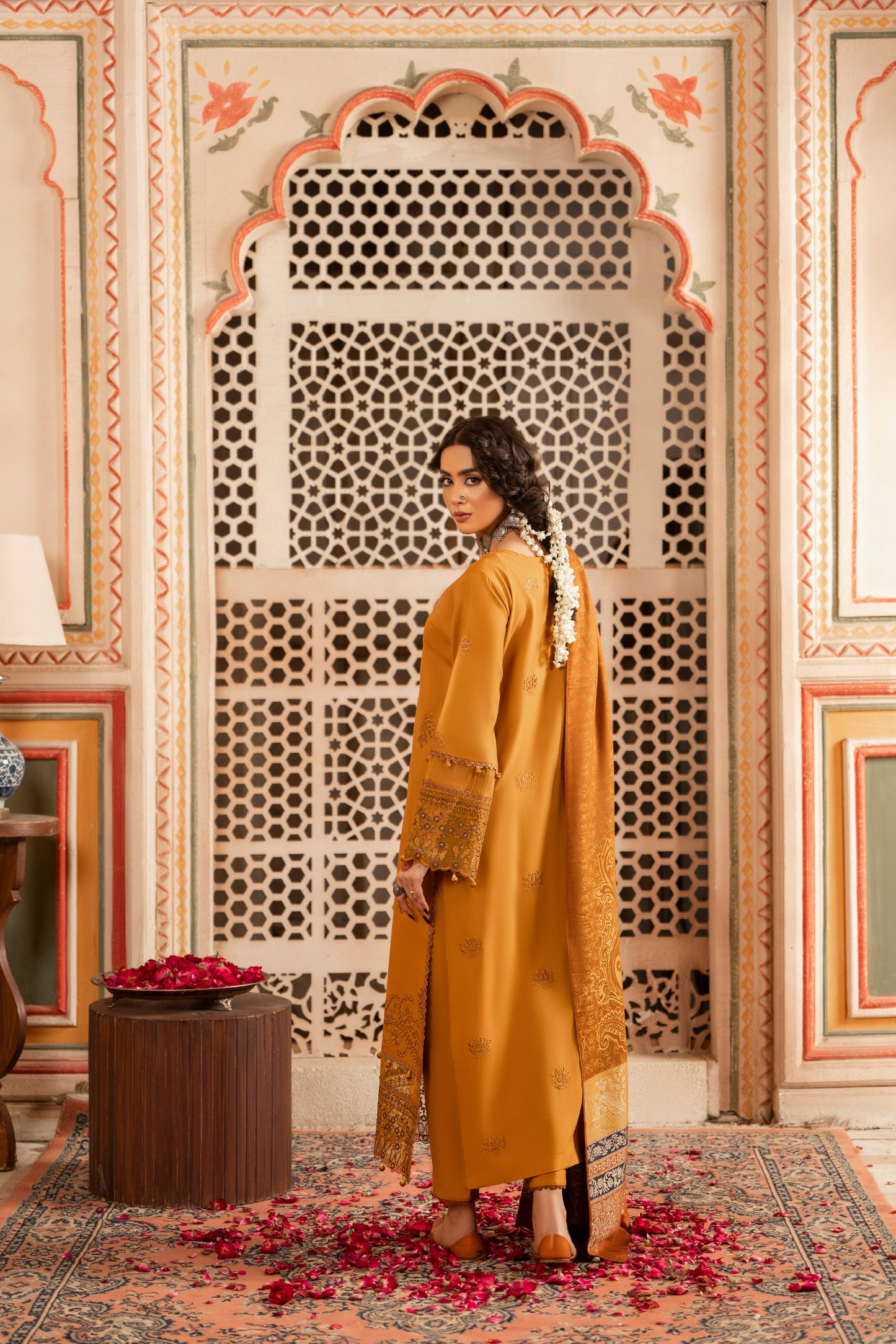 Lavish Dhanak embroidered shirt, jacquard woolen shawl, and plain trouser for classy winter events.