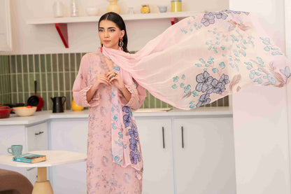 Premium embroidered lawn shirt complemented by chiffon dupatta and cotton trouser set