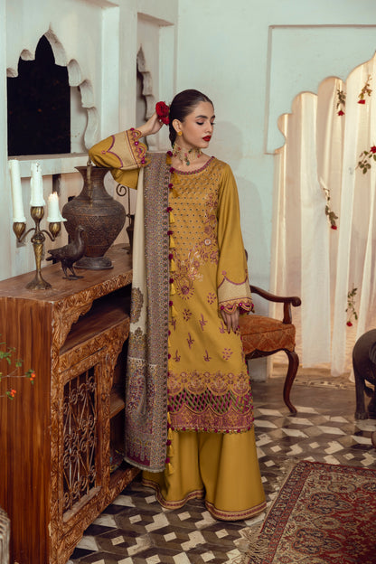 A warm-toned Marina winter look with front embroidery, organza detailing, and a soft Kashmiri shawl.